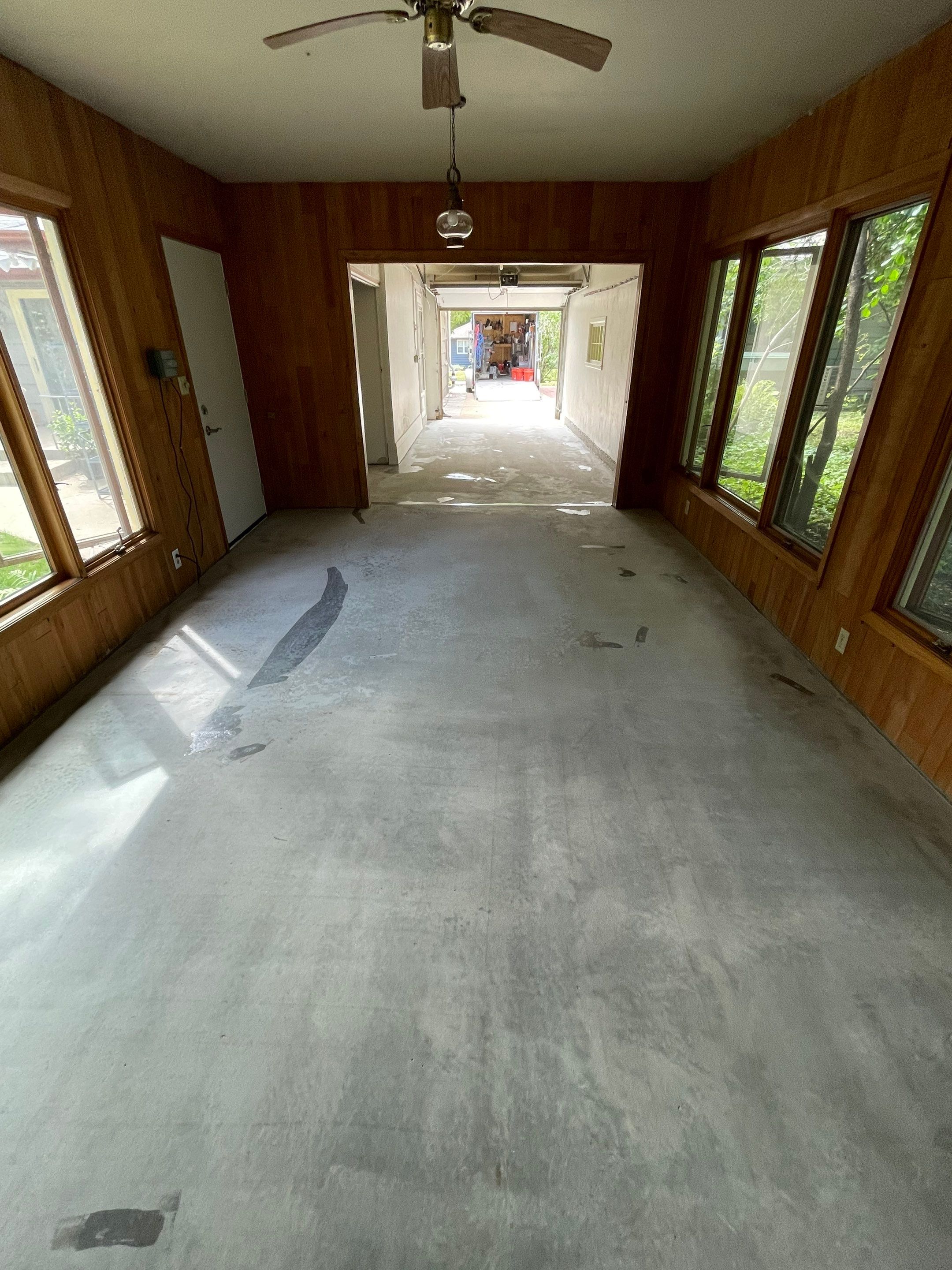 Sioux Falls Garage and Sunroom Concrete Coating with Coyote Flake by Select Painting, Coatings & Garage Cabinets