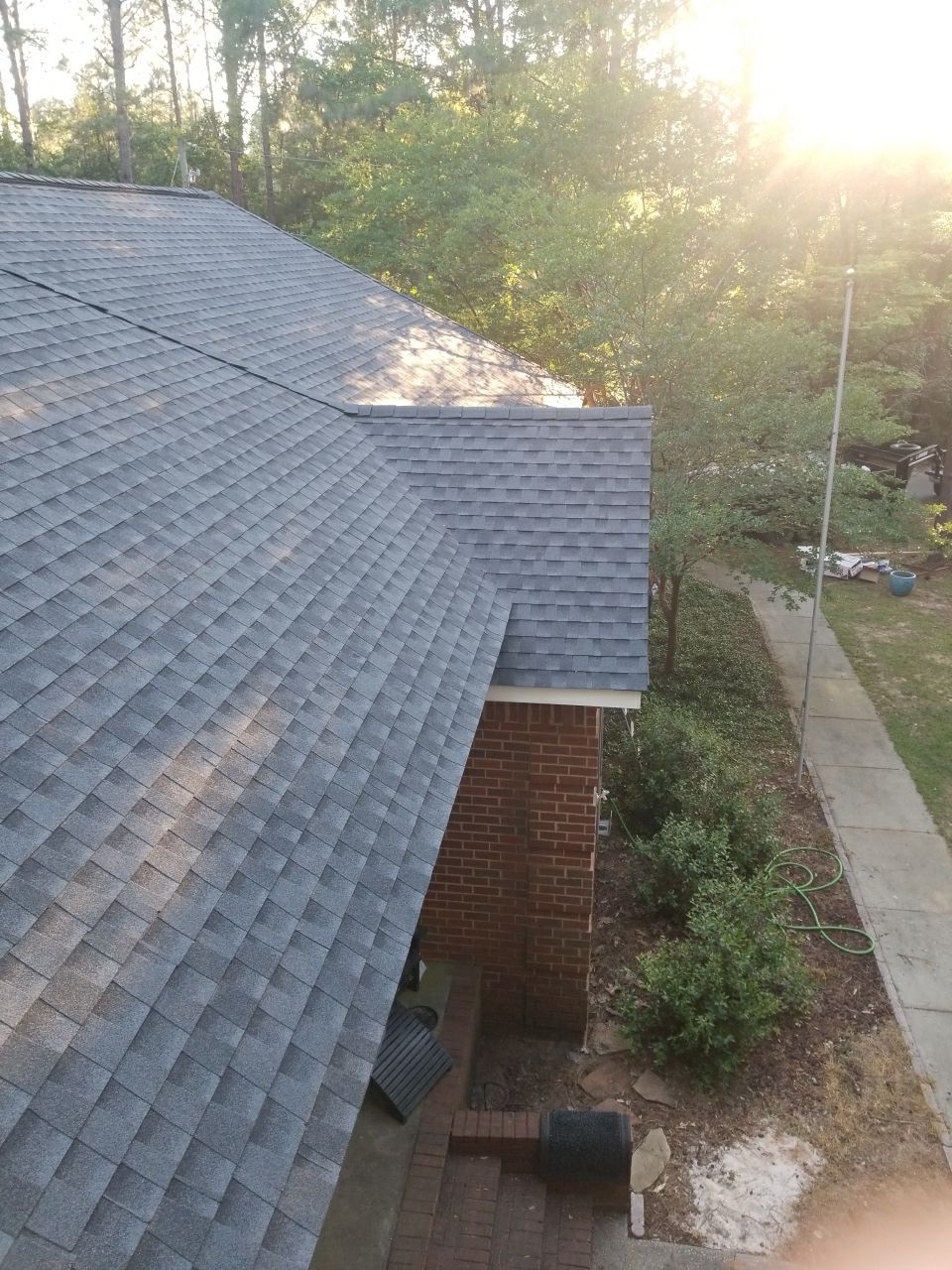 Residential Roofing Installation using Roof Replacement by American Roofing & Construction LLC