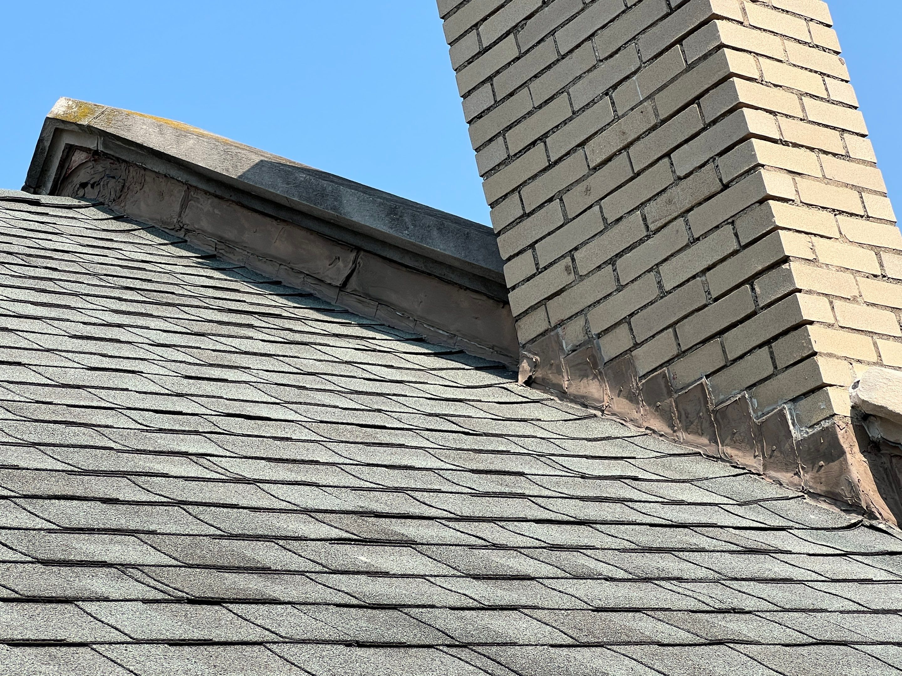 Commercial Roofing Installation using Standing Seam Metal - Frost Black by RoofX 