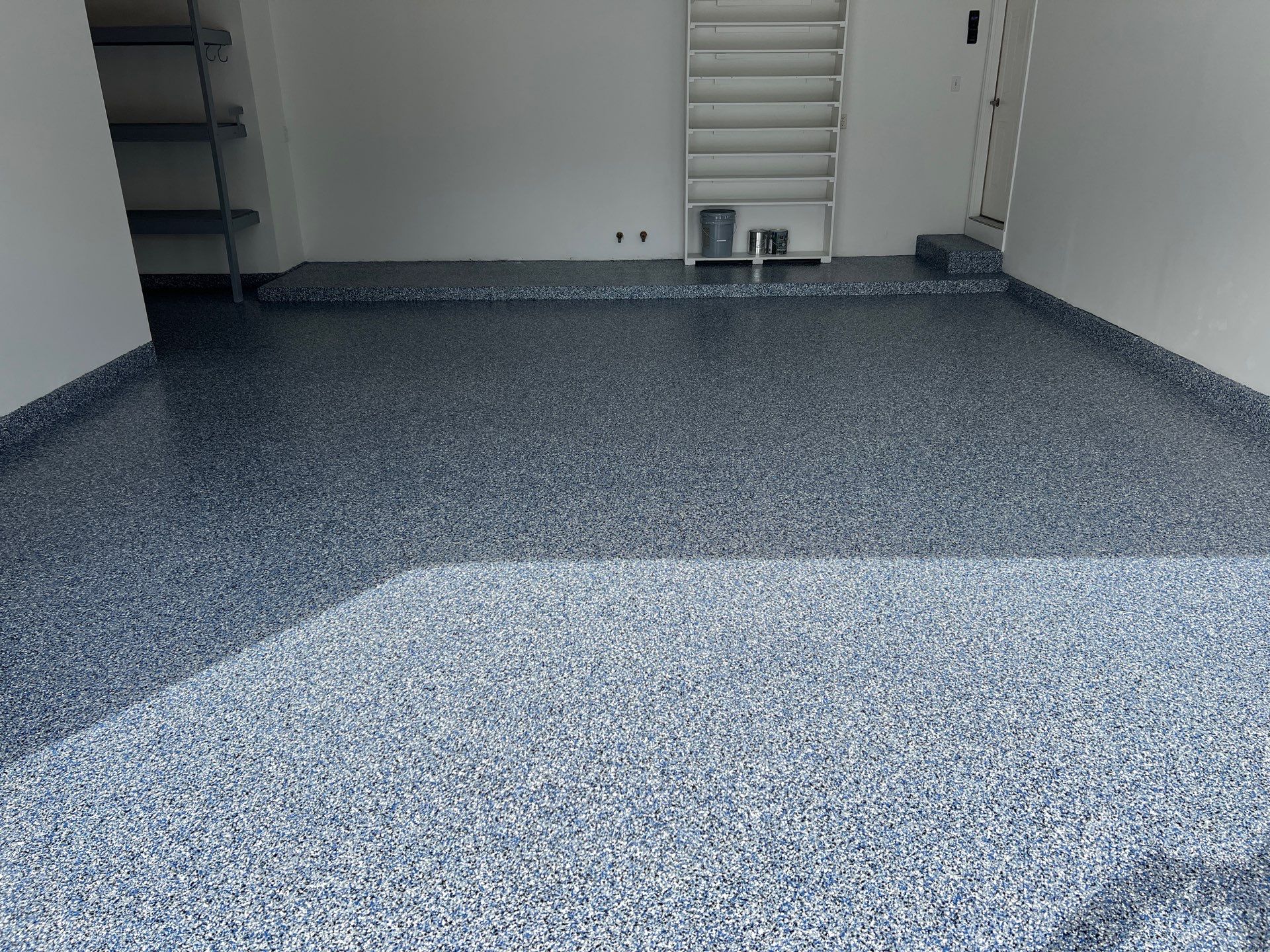 Custom Epoxy Flake Floor and Garage Wall Renovation in Ada by Gordon Painting