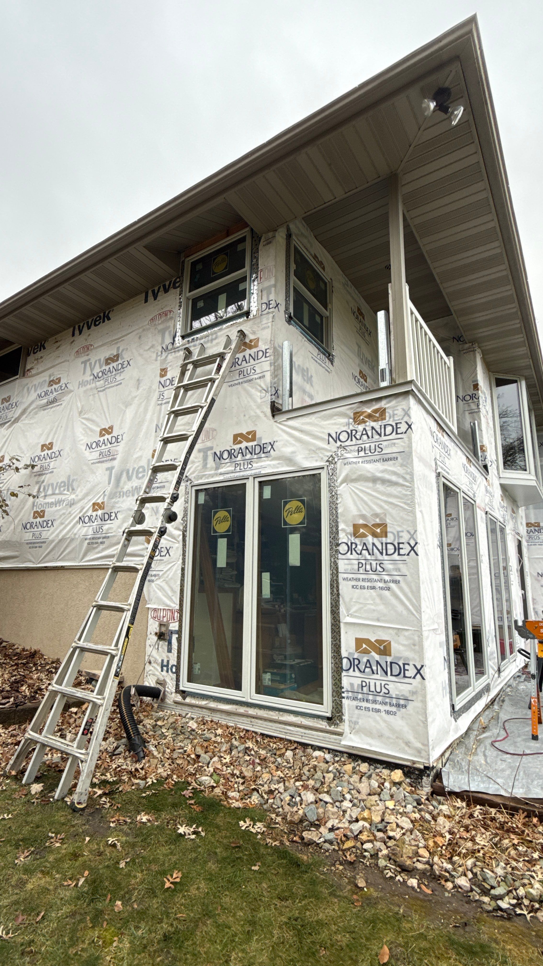A Clean Window Upgrade Ready for New Siding with Pella Lifestyle Series by United Windows and Siding LLC