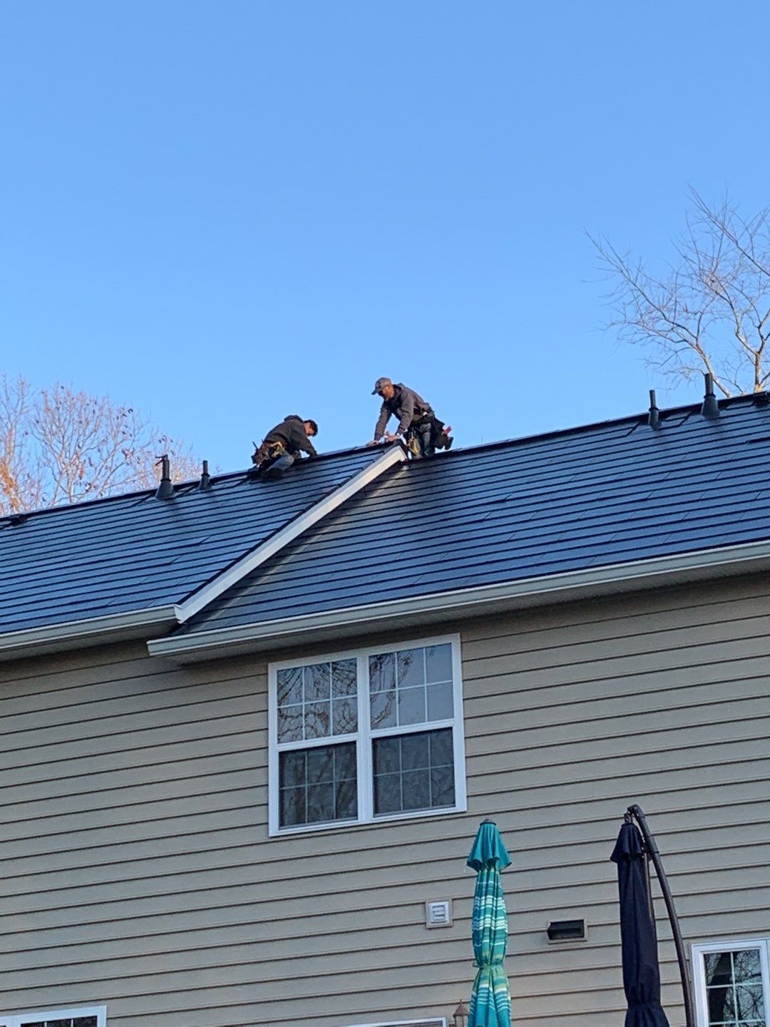 Tesla Solar Roof Replacement by American Home Contractors