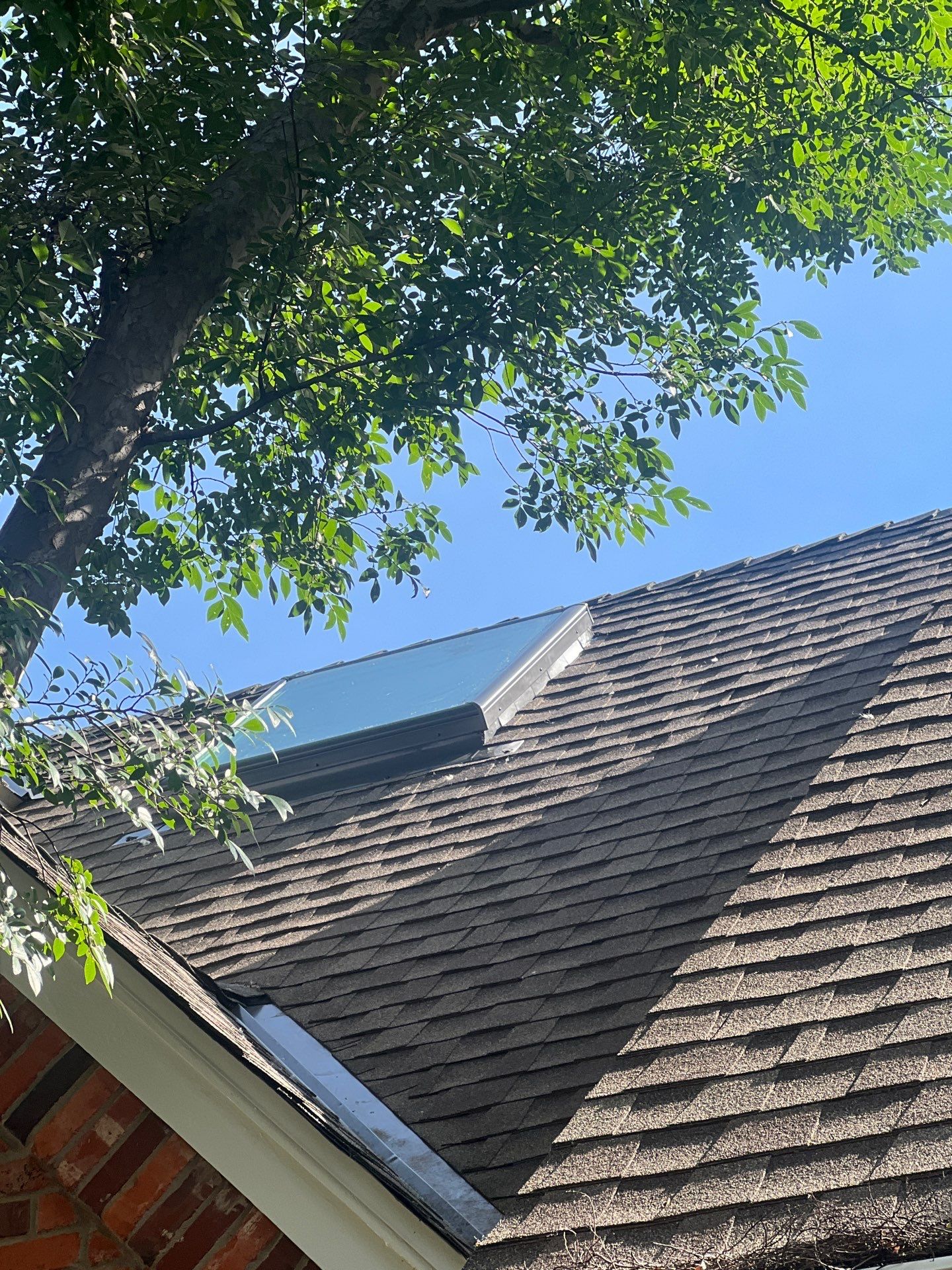 Skylight Replacement in Edmond, OK by McCann's Roofing and Construction