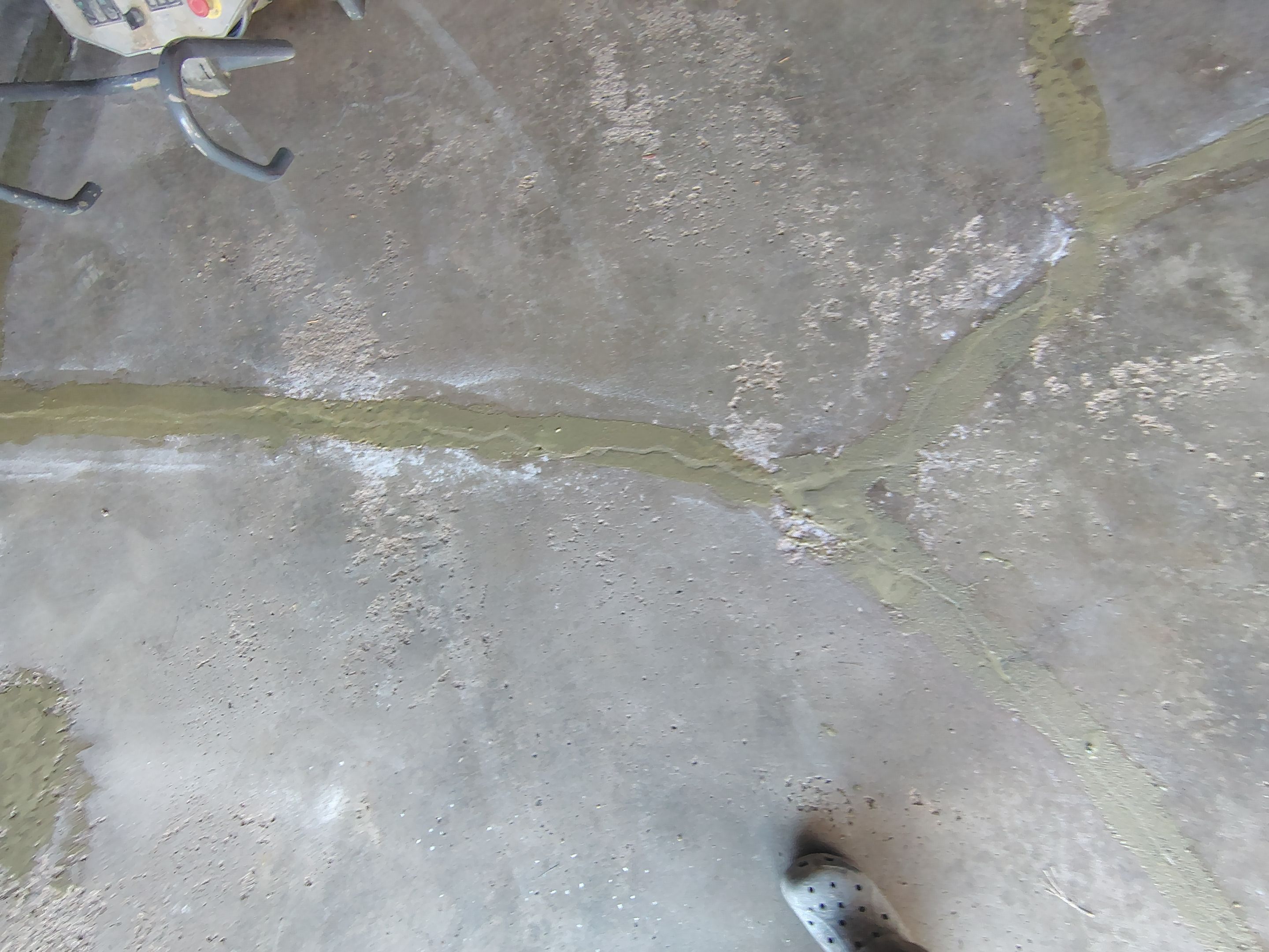 Sioux Falls Garage Epoxy Floor Installation and Concrete Crack Repair by Select Painting, Coatings & Garage Cabinets