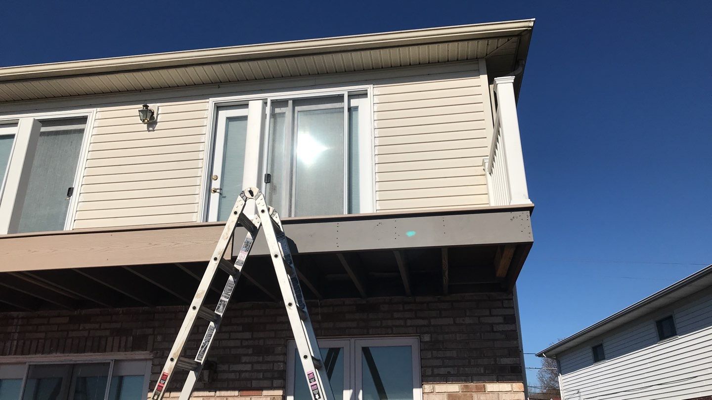 Deck Refurbush and Door Replacement using Trex Decking and Railing. Polaris Patio Doors by Secure Construction Company Inc