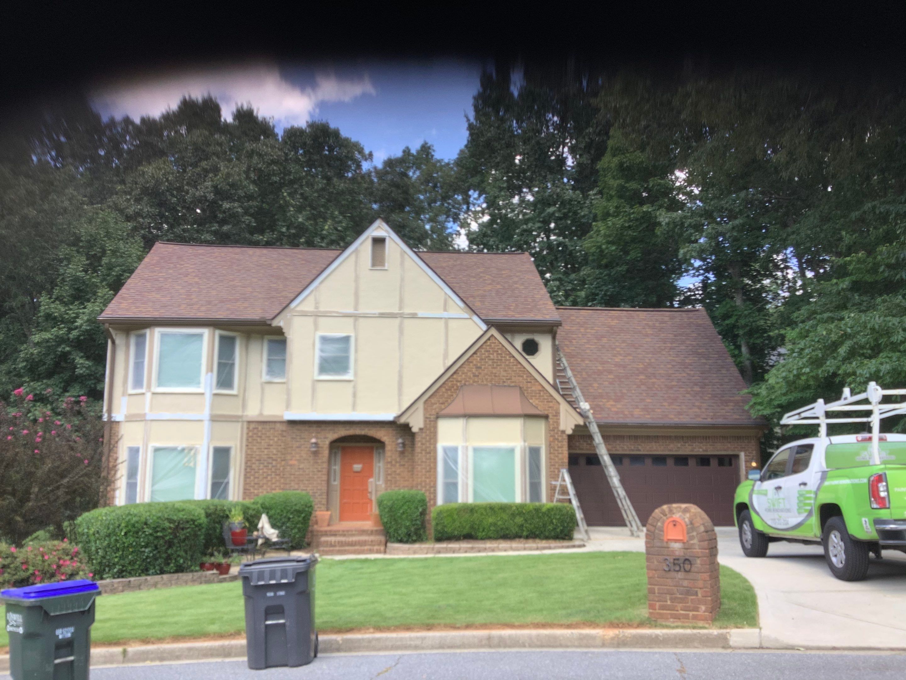 Complete Exterior Painting and Trim Refresh for Roswell Tudor Home by Swift Home Renovations