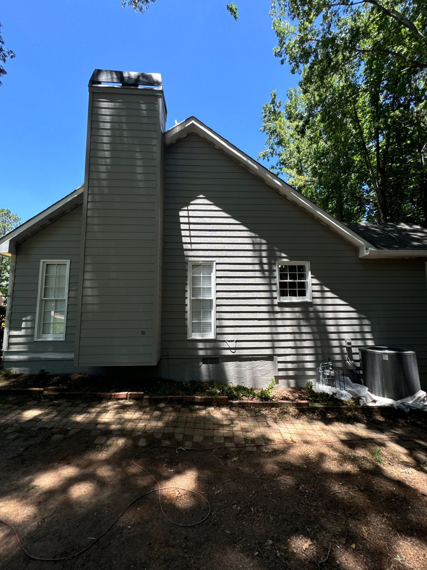 Exterior Painting and Chimney Siding Refresh in Woodstock, Georgia by Swift Home Renovations