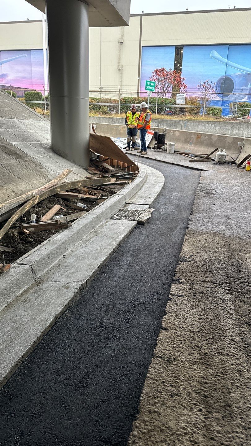 Kraemer North America | Airport Road Repair by Jireh Asphalt & Concrete Inc 