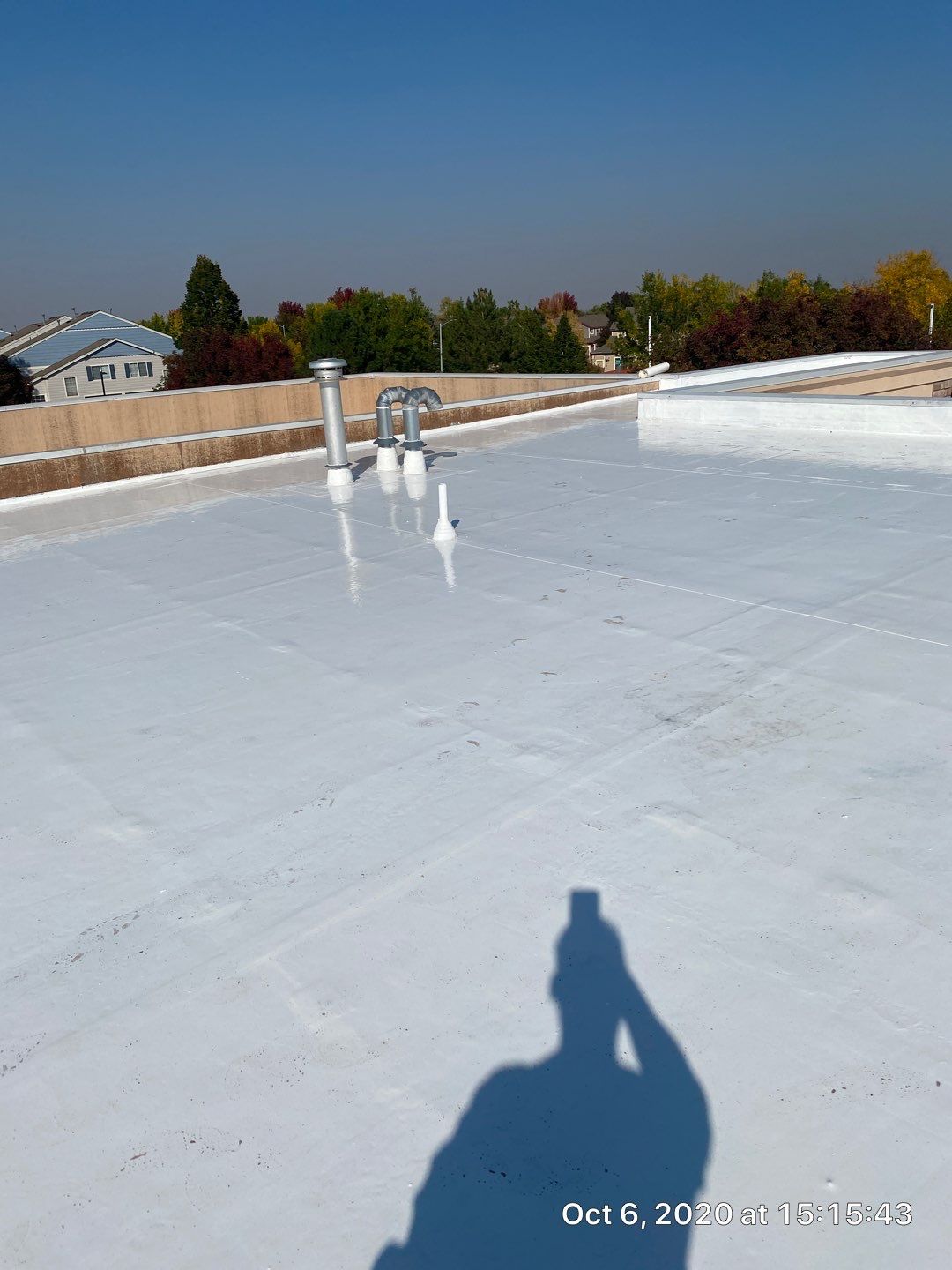 Commercial Roofing Installation using American Standard Coating - S  by A to Z Roofing