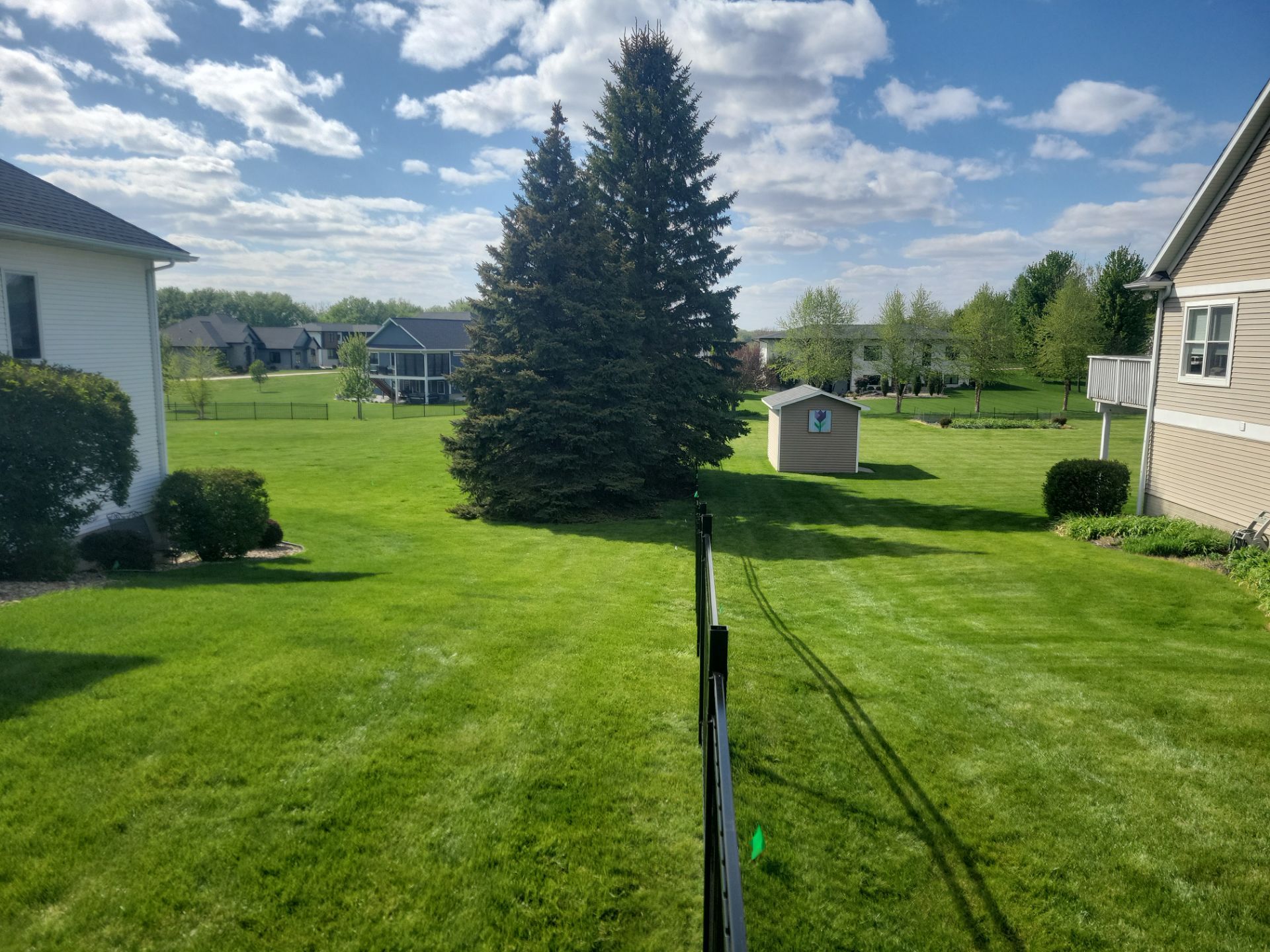 Black Ornamental Metal Picket Fence Installation in Waterloo by Perfect Picket Fence and Stain