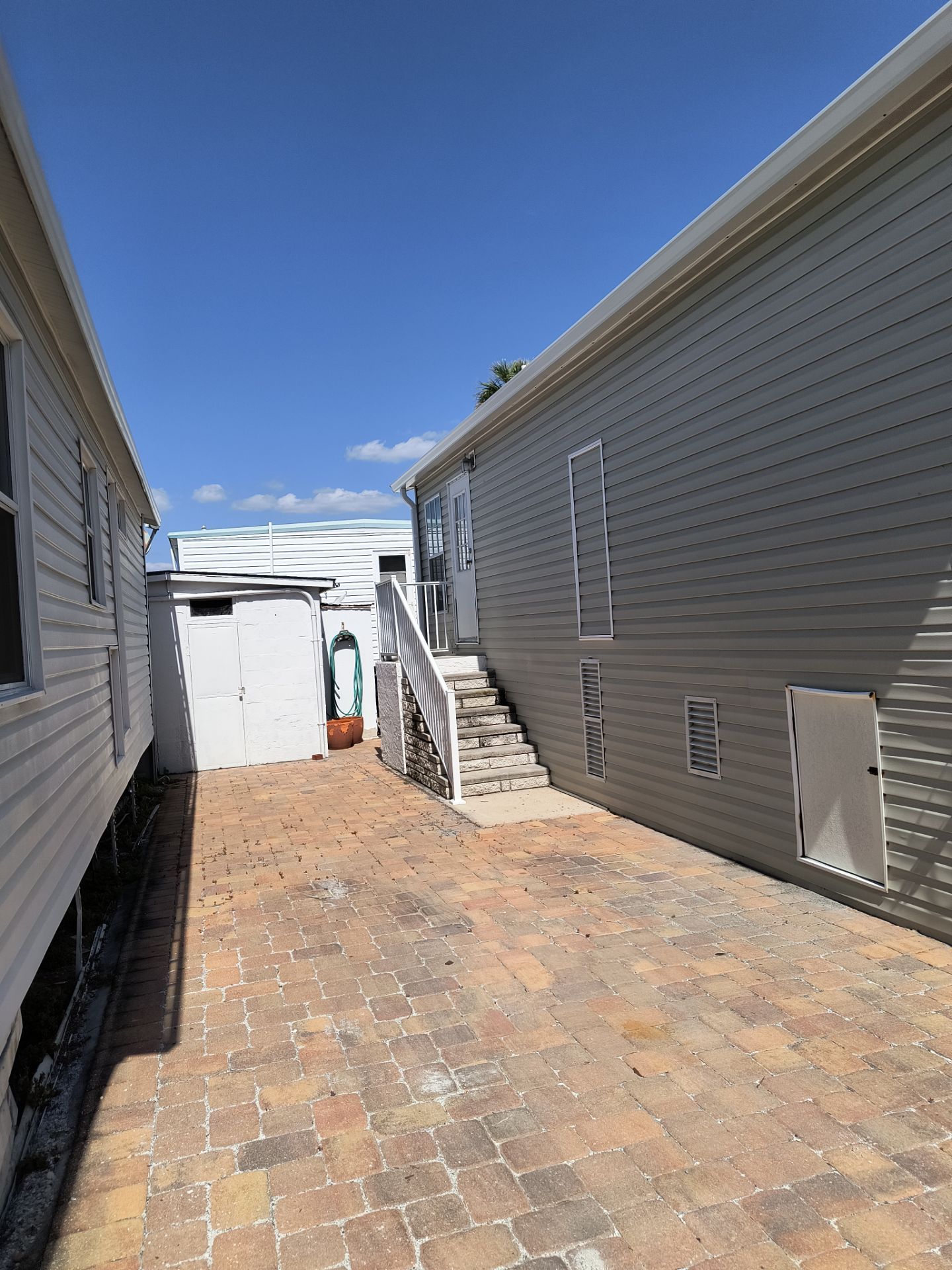 White K-Style Gutters for Beach Homes in Longboat Key FL by Gutter Professors