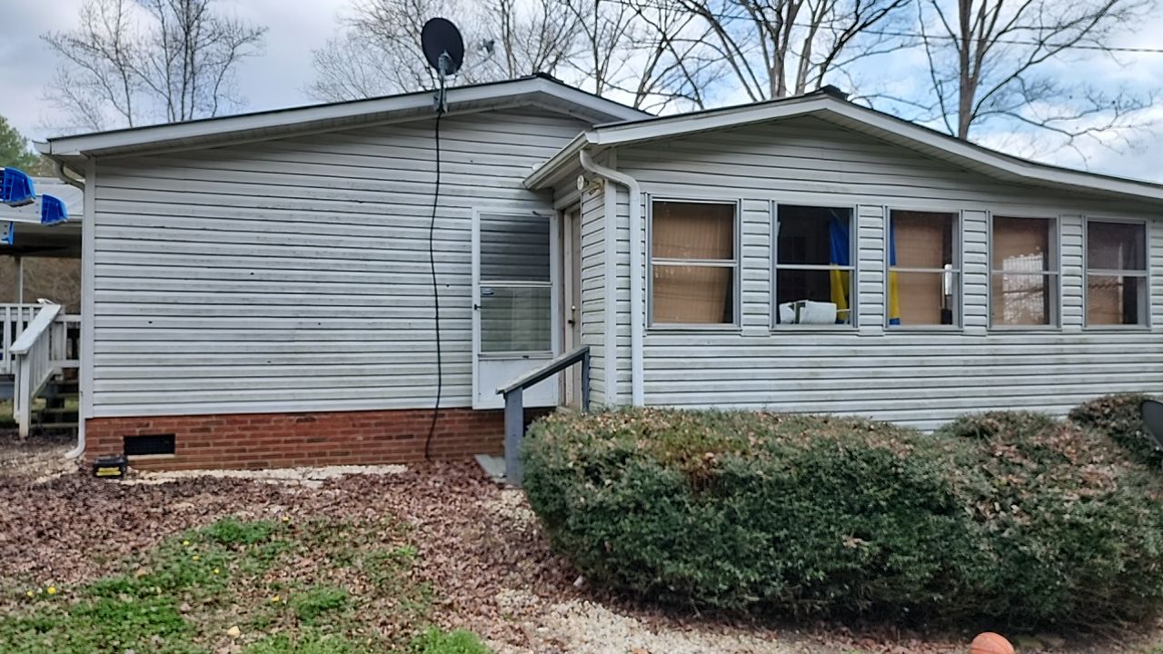House Wash using cleaner by Power Wash Masters LLC