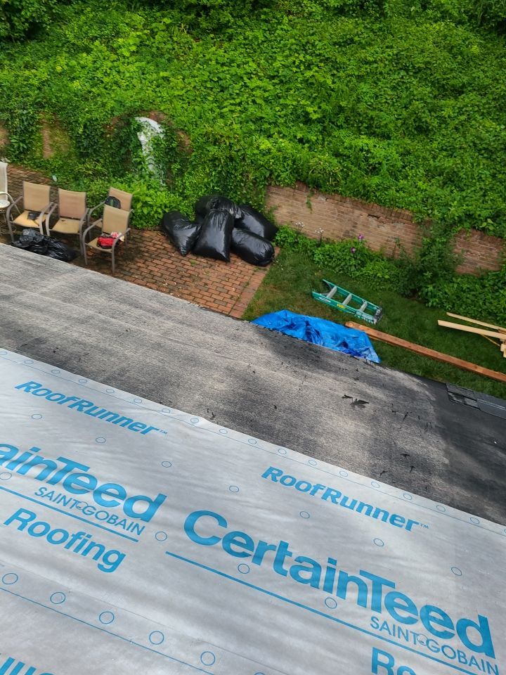 Springfield Tree Damage Restoration: CertainTeed Landmark Designer Shingles in Charcoal Black by RM Banning, Inc.