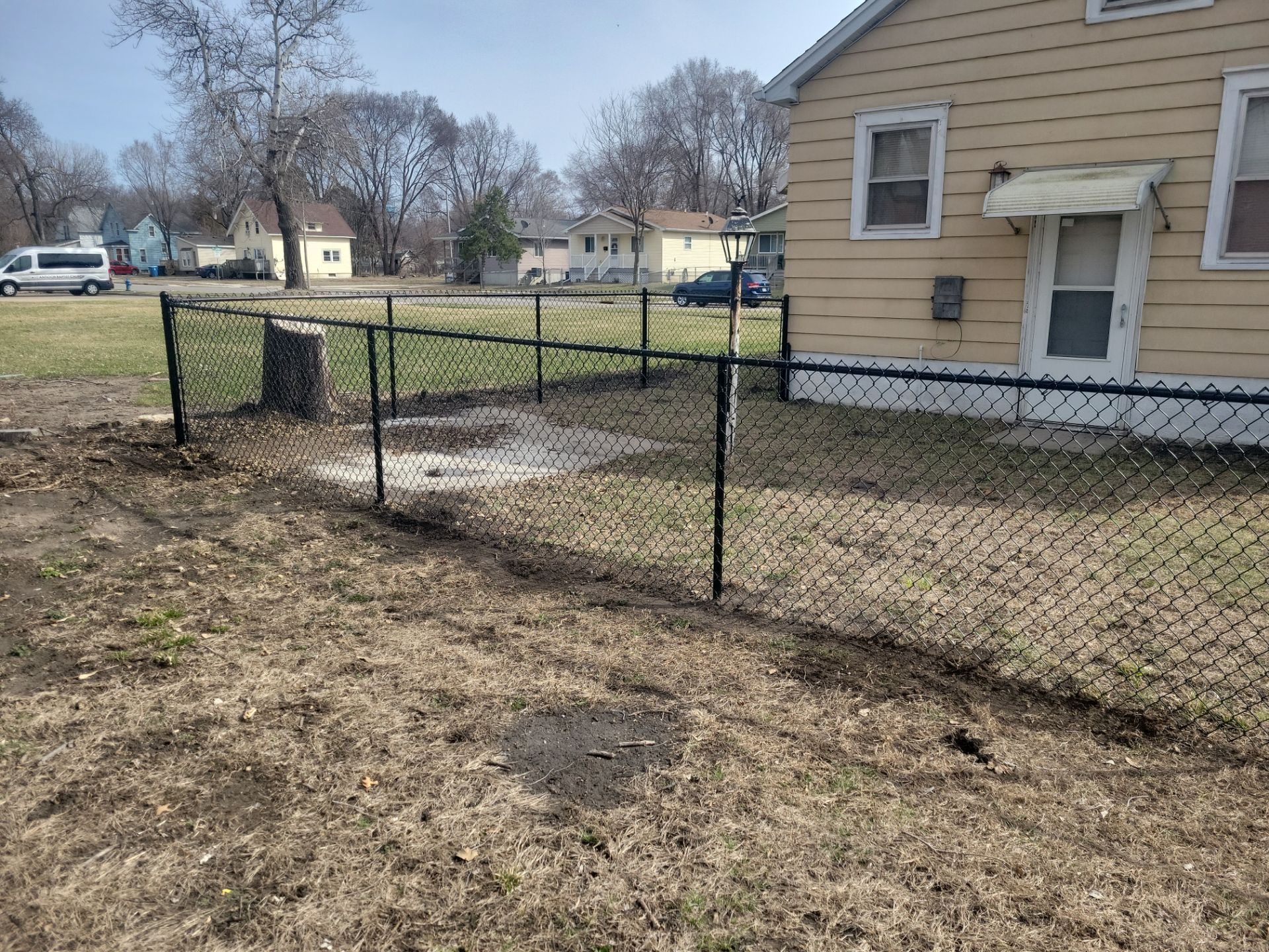 Black Chain Link Fence and Gate Installation in Waterloo by Perfect Picket Fence and Stain