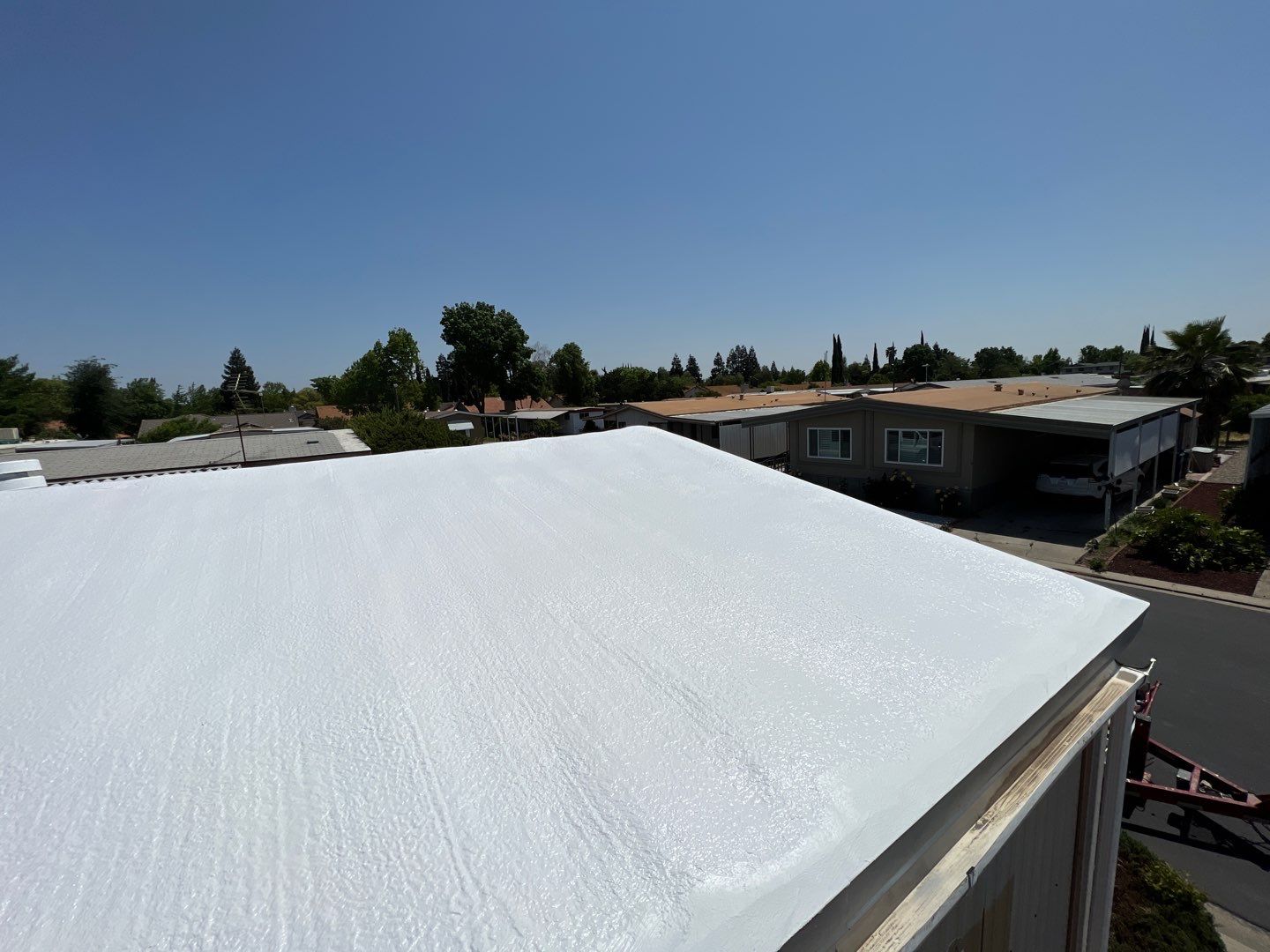 Spray foam and coatings using General Coatings acrylic coatings and spray foam by Straight Edge Roofing Inc