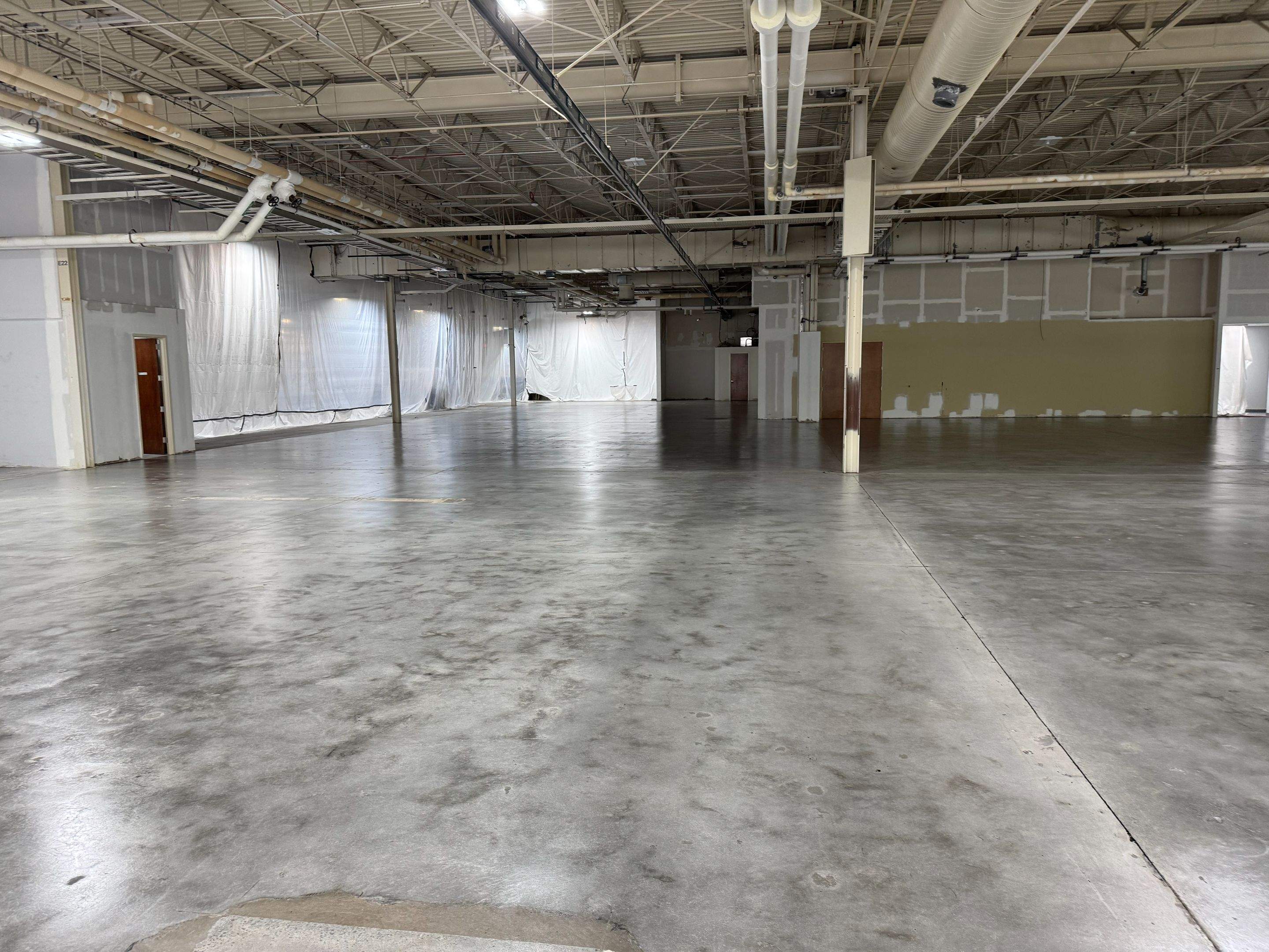 IBM Drive 18,000sqft manufacturing facility grind and seal. by Endure Concrete Coatings