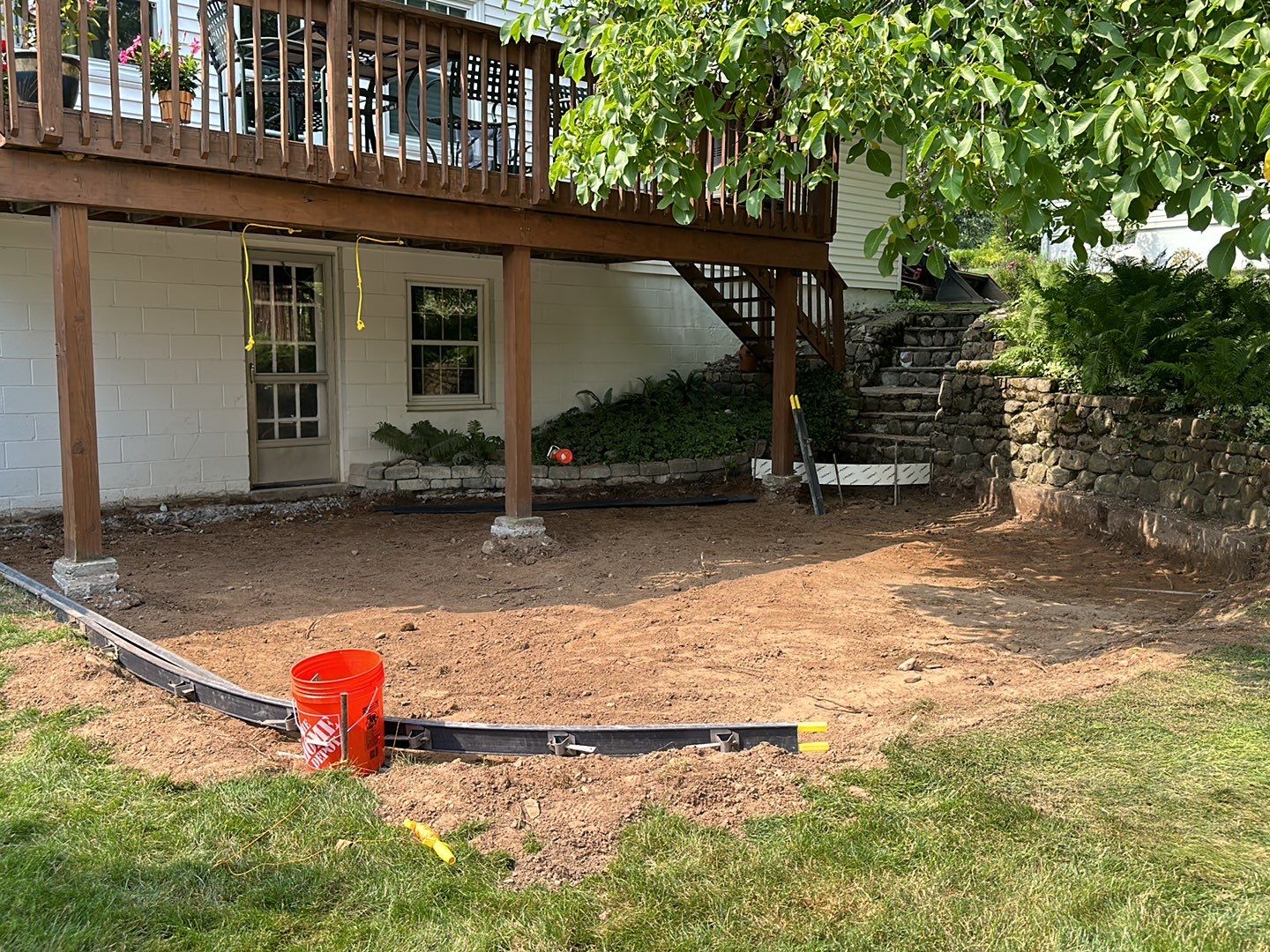 Majestic ashlar stamped concrete patio  by NG Masonry & Construction LLC