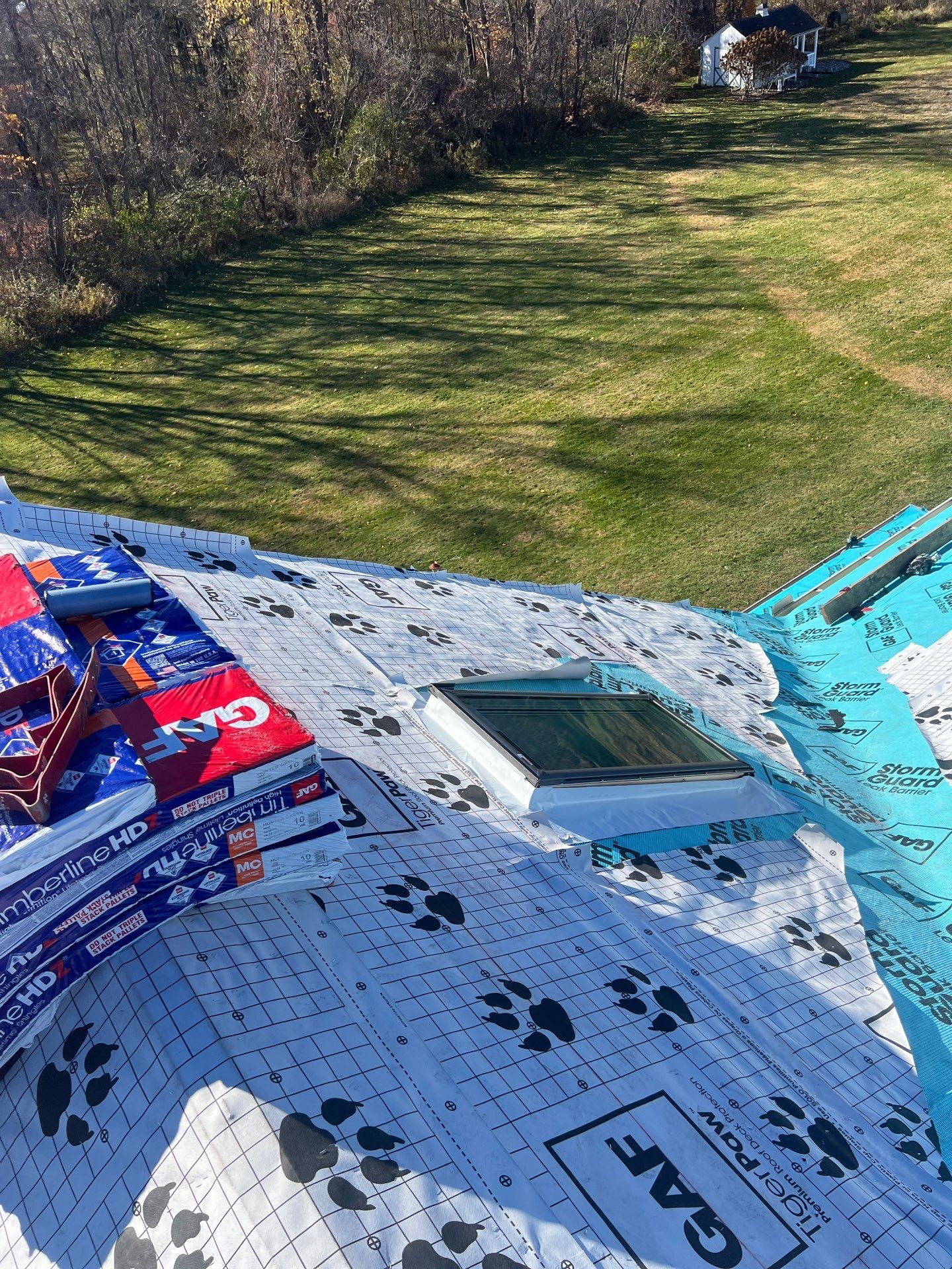 Residential Roofing Replacement with Multiple Skylights in Mason, Michigan by Acme Exteriors