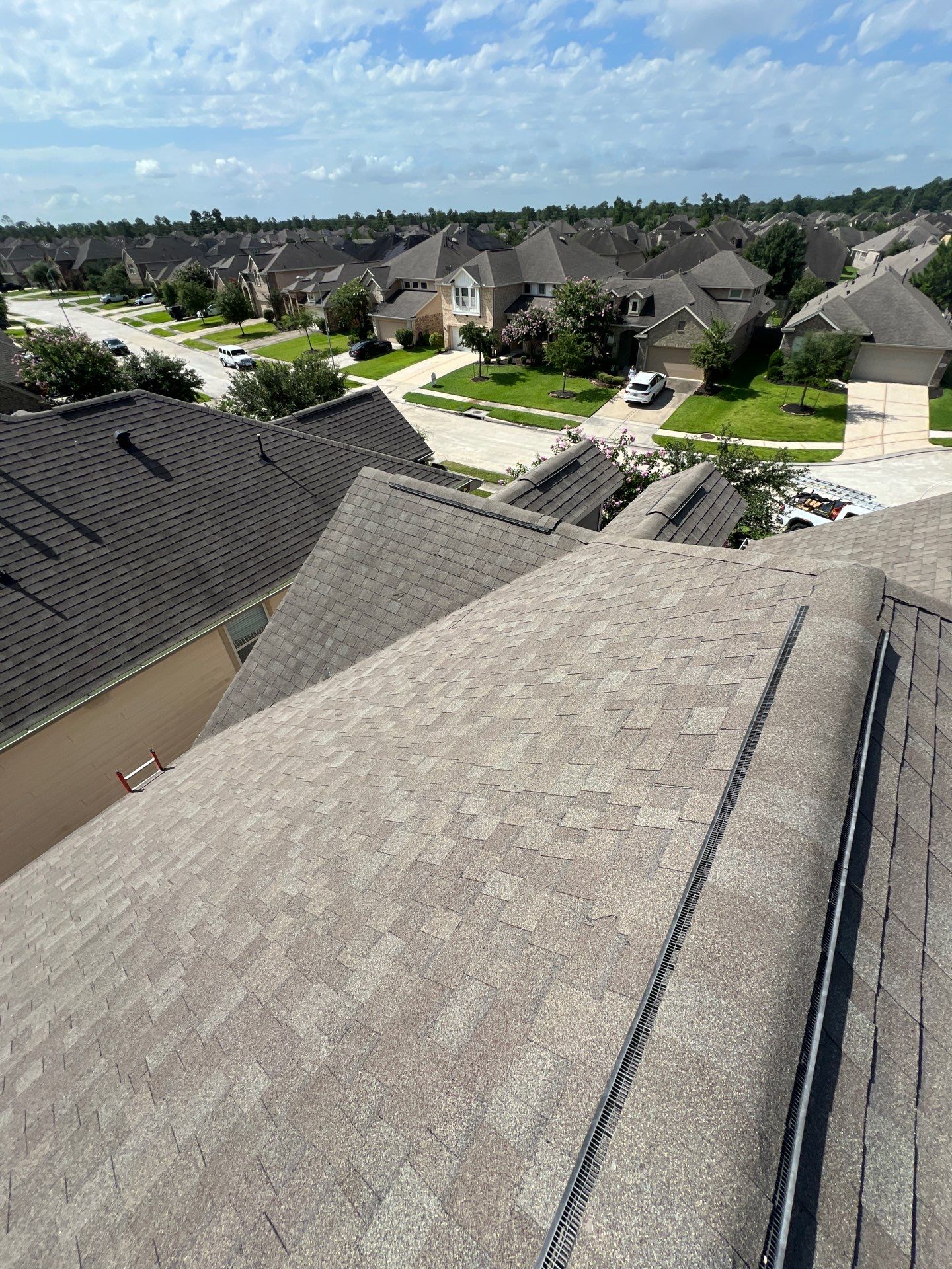 Hail Damage using Owen's Corning Duration (Lifetime) Shingles by Roof Repair Company