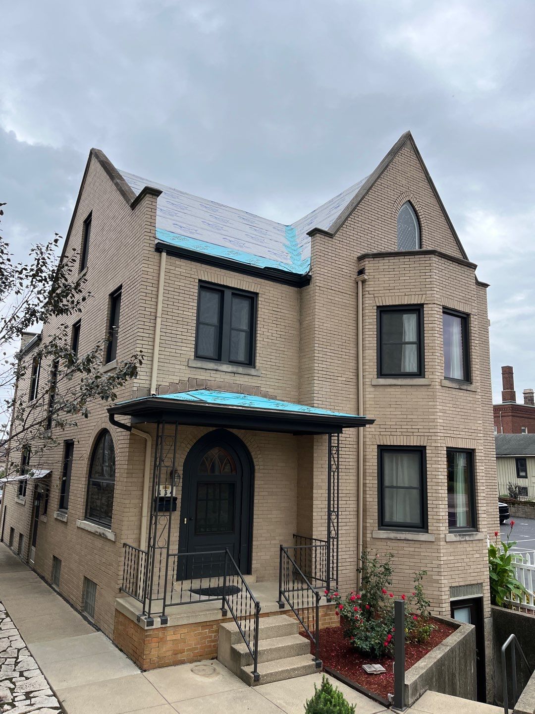 Commercial Roofing Installation using Standing Seam Metal - Frost Black by RoofX 