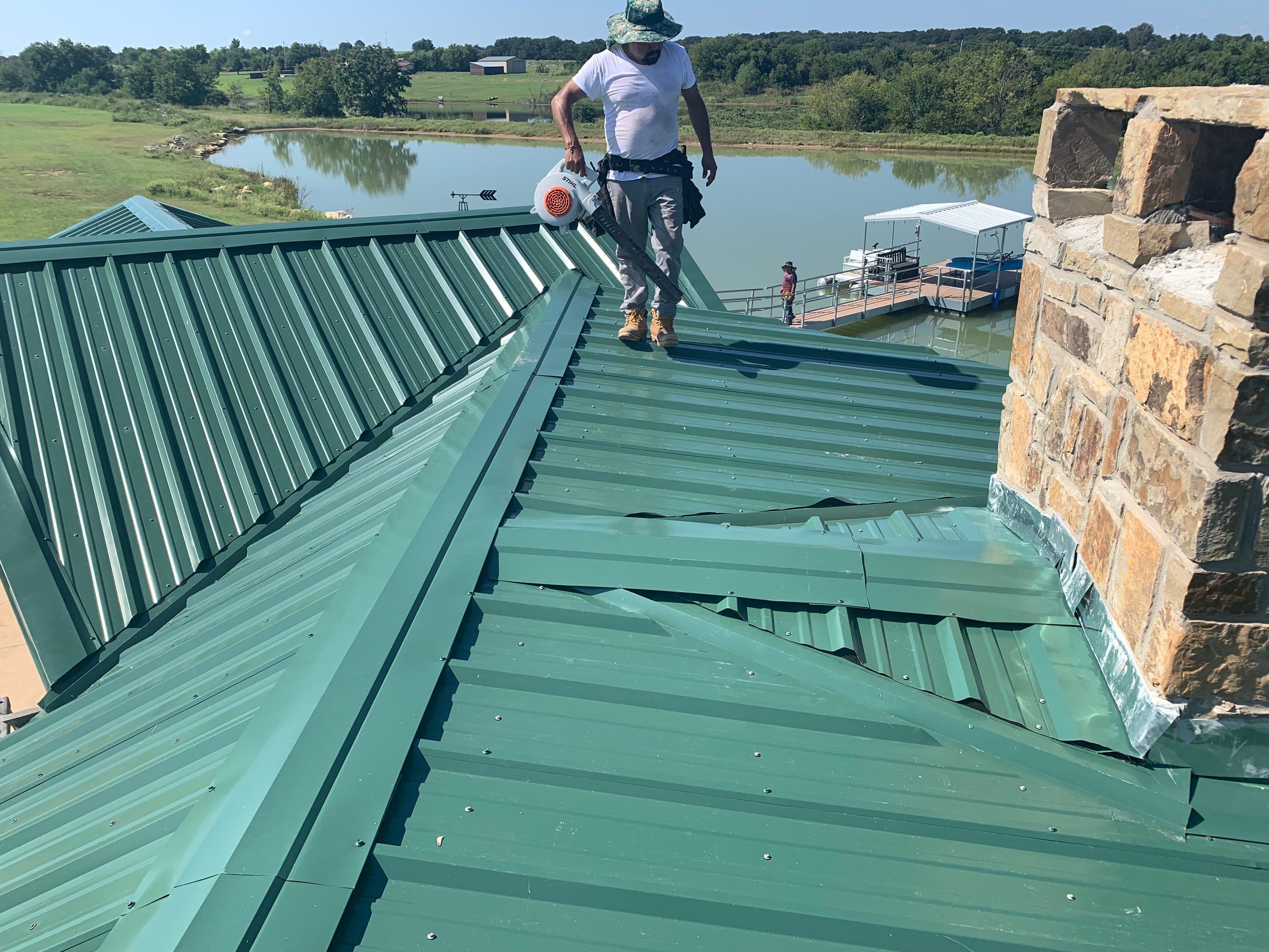 Roofing a Small Paradise by BANA Roofing and Solar Supply