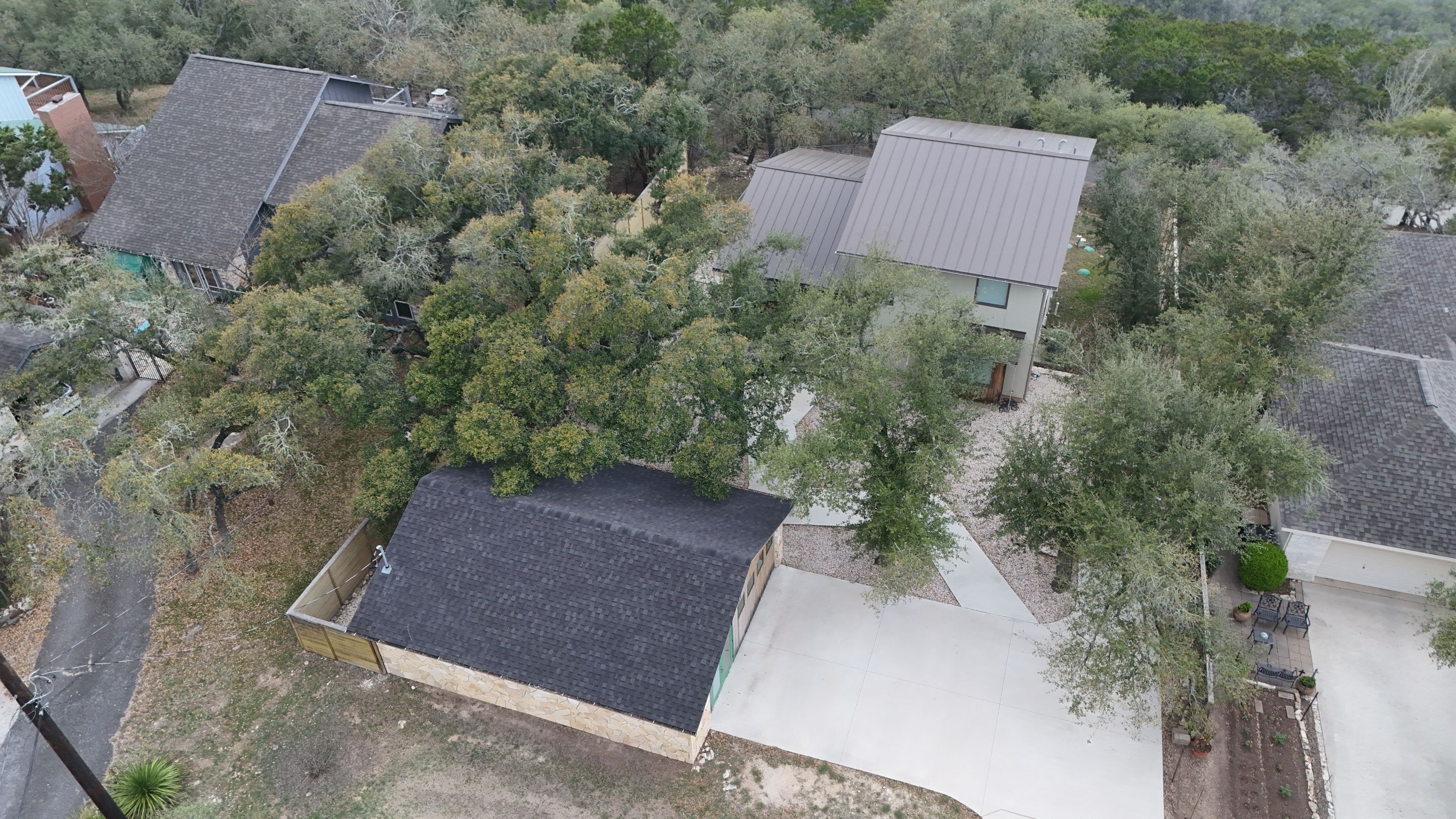 Residential Roof Replacement using 24 GA Double-Lock - Medium Bronze by Action Exteriors Austin