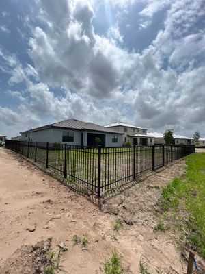 Aluminum Fence Installation using Black 3 Rail Aluminum Fence