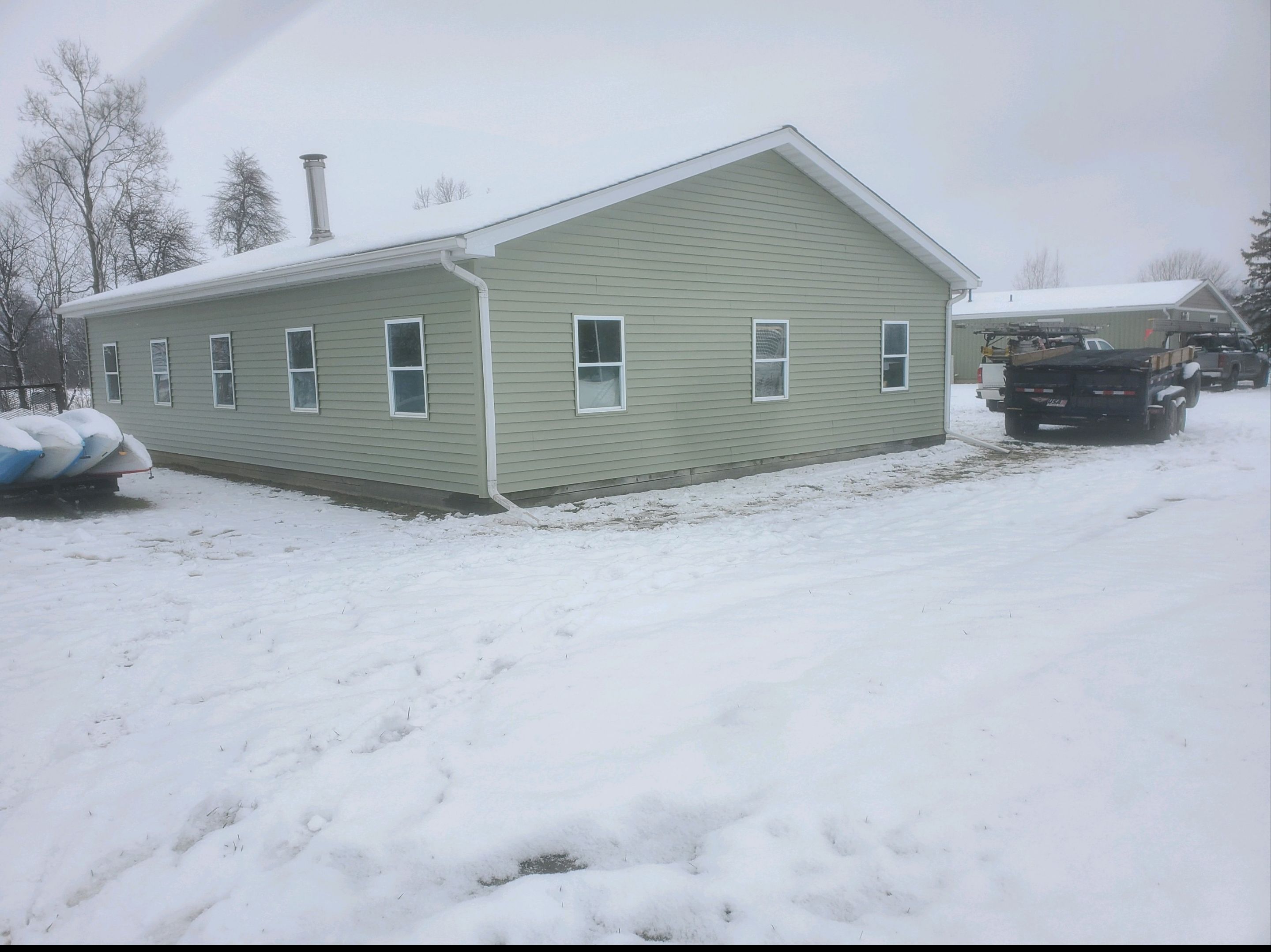 Cypress Siding and New Gutters by 42 North Construction, LLC.