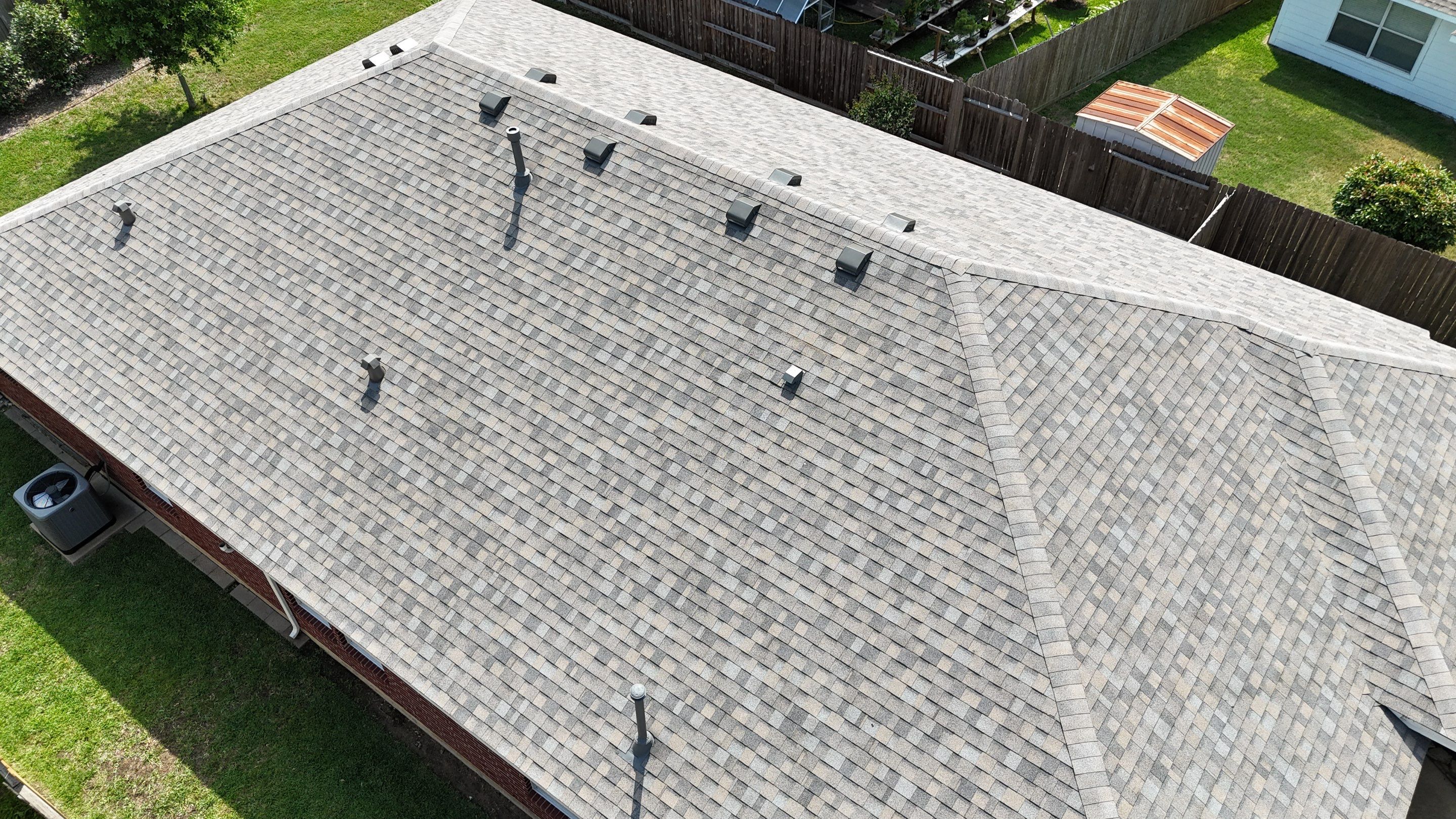 Residential Roofing & Gutter Installation using IKO Dynasty by Core Four Roofing