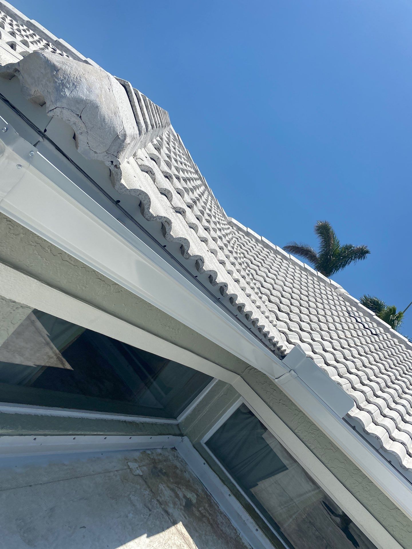 Splash Guard Gutters for Coastal Homes in Longboat Key FL by Gutter Professors