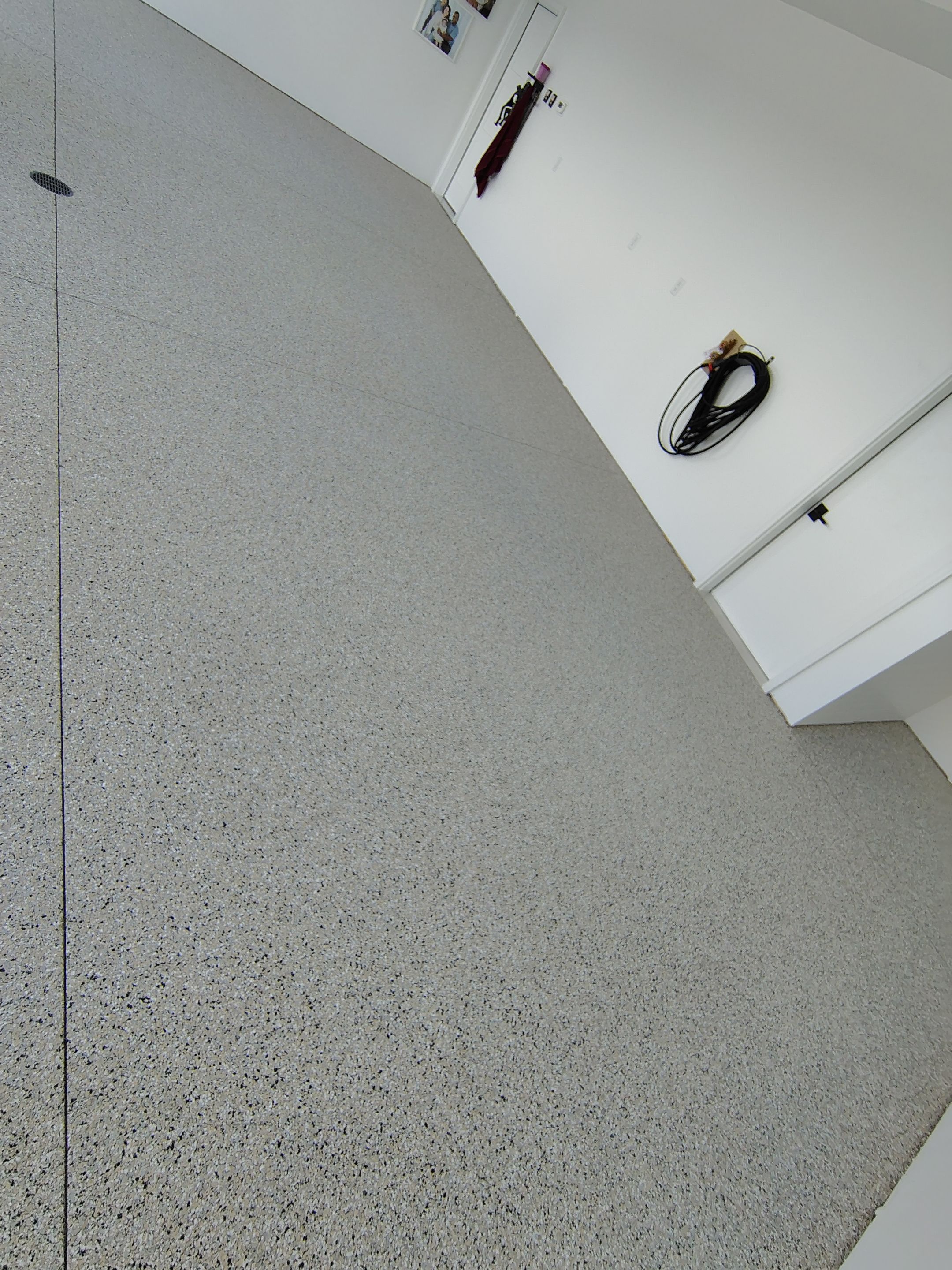 Gray and White Speckled Epoxy Garage Floor Coating in Tea by Select Painting, Coatings & Garage Cabinets