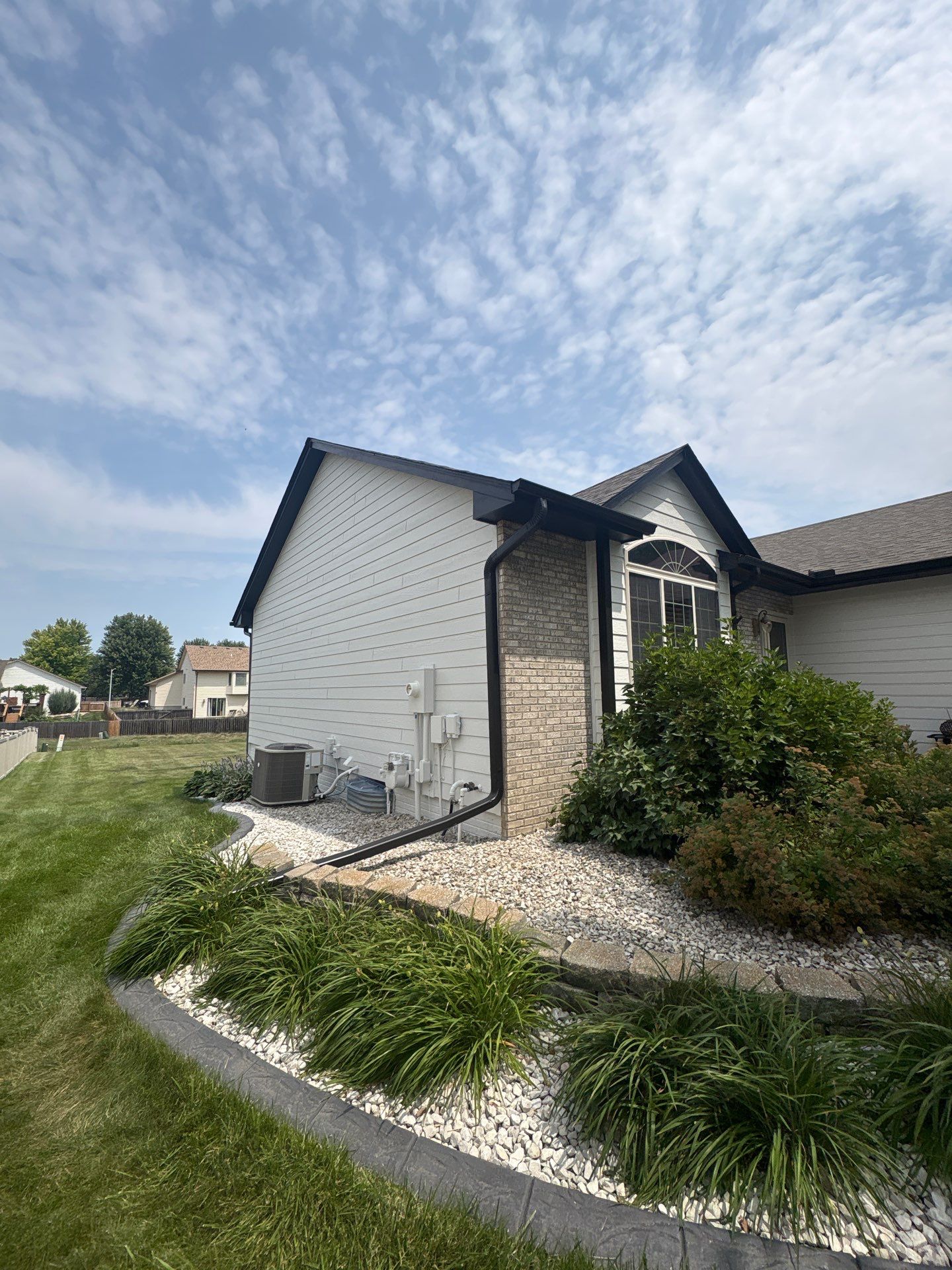 Residential Exterior Painting and Siding Refresh in Sioux Falls by Select Painting, Coatings & Garage Cabinets