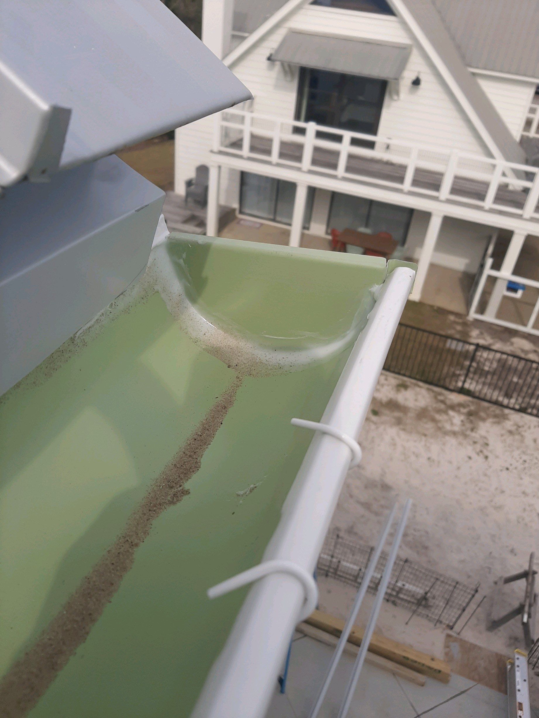 Gutter Installation Using 6 Inch Seamless Aluminum Gutters by Gutter Professors