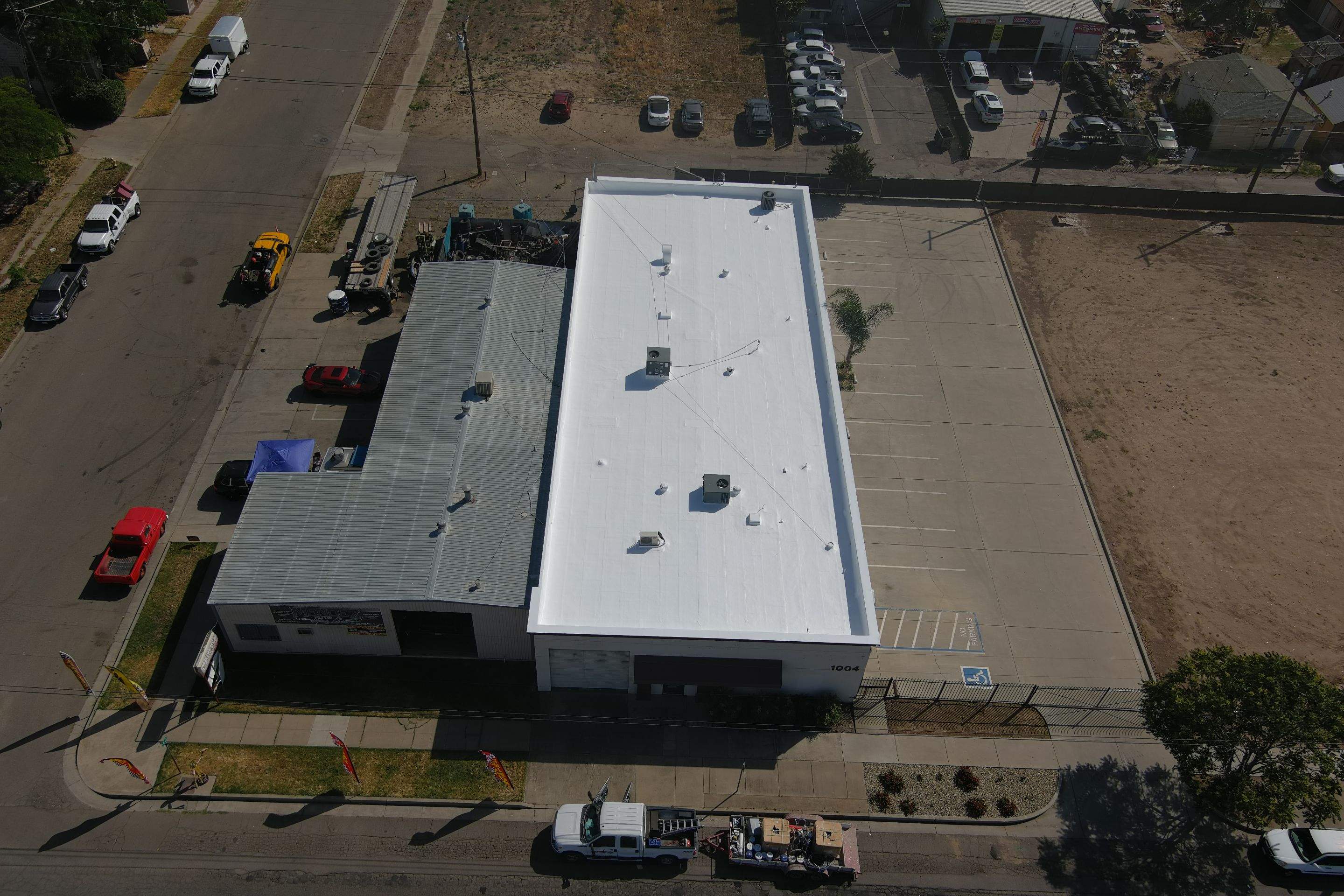 Spray foam and coatings using Conklin Benchmark/PUMA XL coatings and spray foam by Straight Edge Roofing Inc