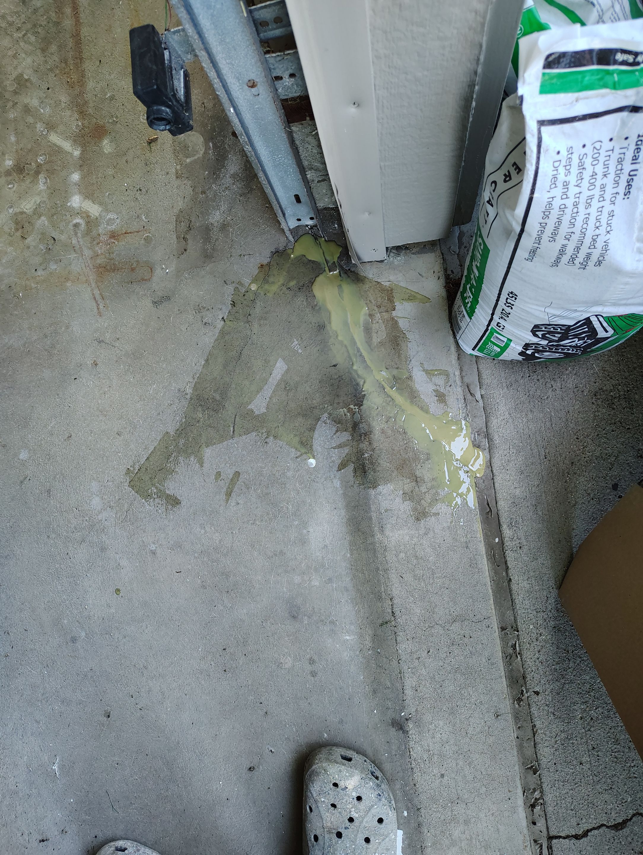 Sioux Falls Garage Concrete Repair and Epoxy Flake Floor Coating by Select Painting, Coatings & Garage Cabinets