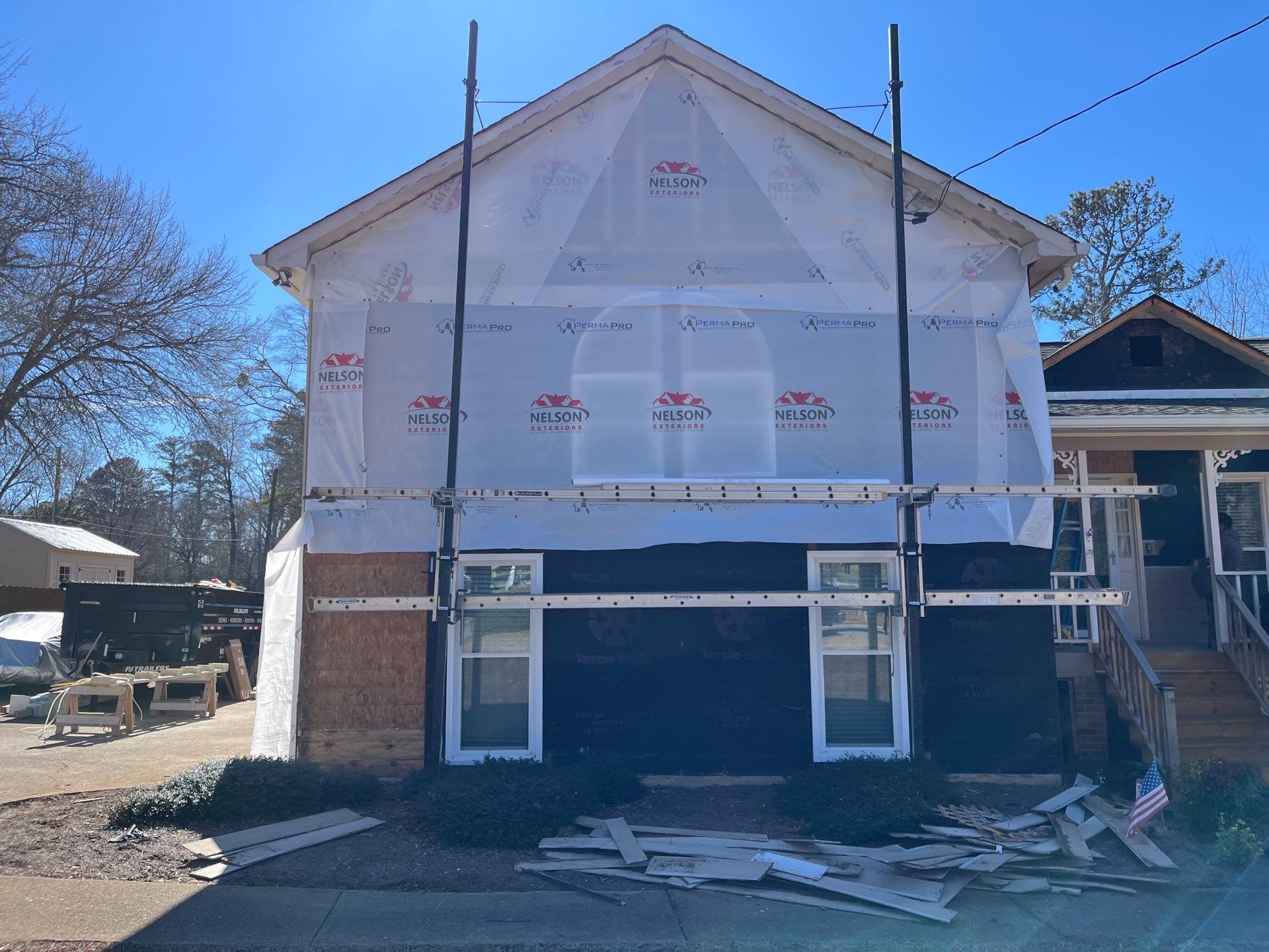 Acworth, GA James Hardie Board and Batten Siding Installation, Porch Renovation, Exterior Painting, and Window Replacement by Nelson Exteriors 