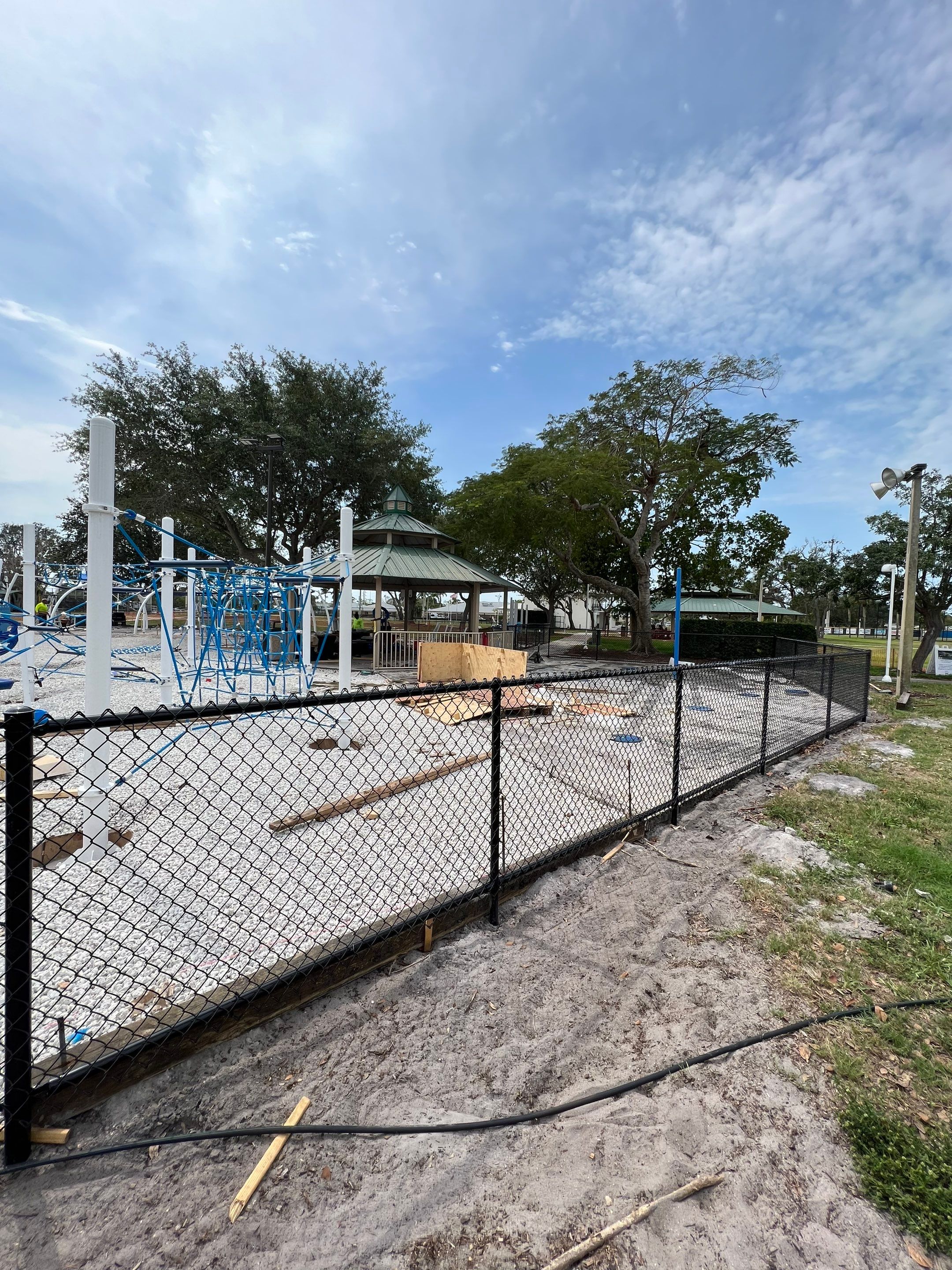 Vinyl Coated Chain-link fence for the City of Naples around Fleischmann Park Playground.  by Asap fence and gates, LLC