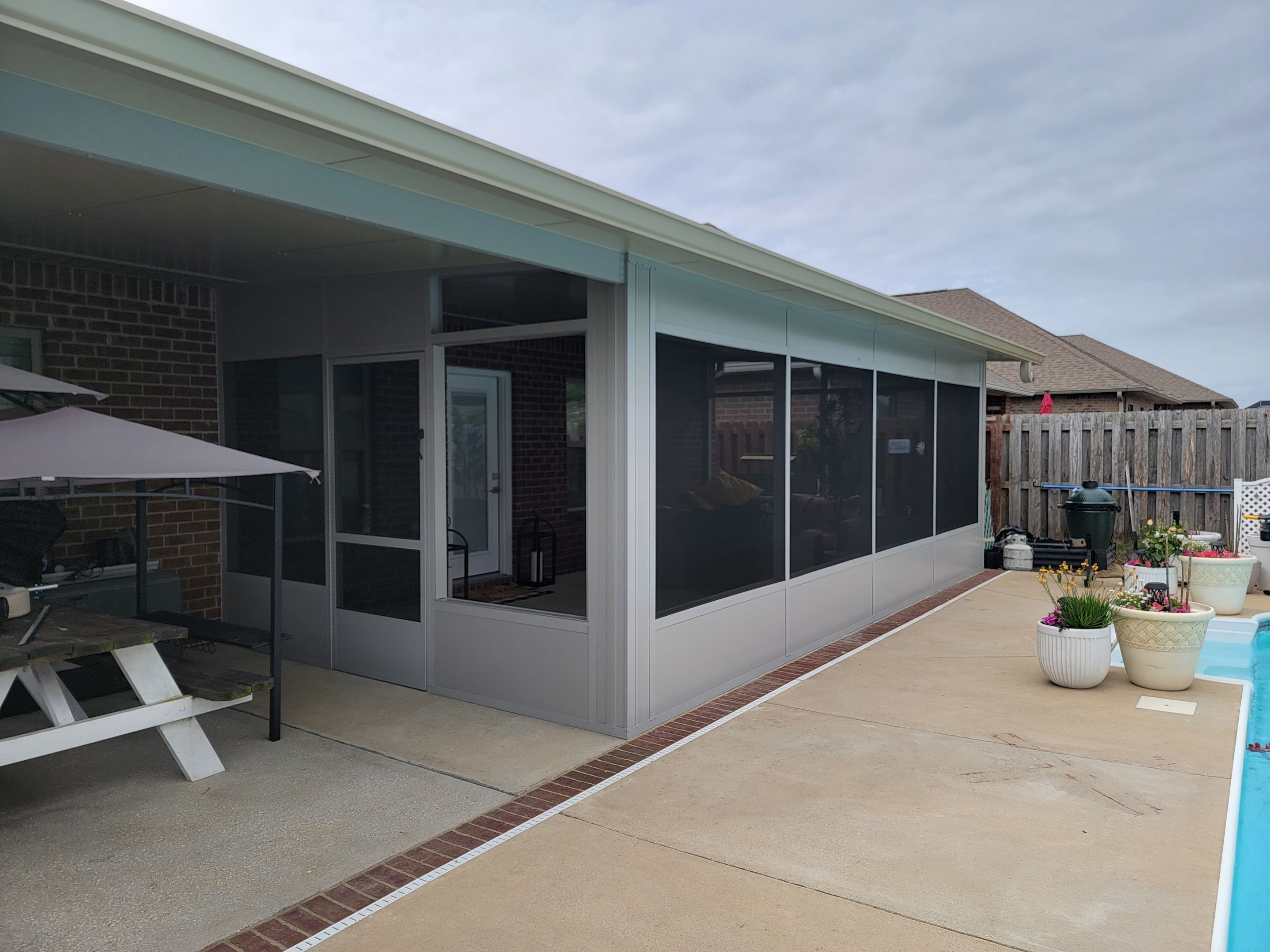 Poolside Screen Room & Patio Cover in Gulf Breeze by Titan Sunrooms