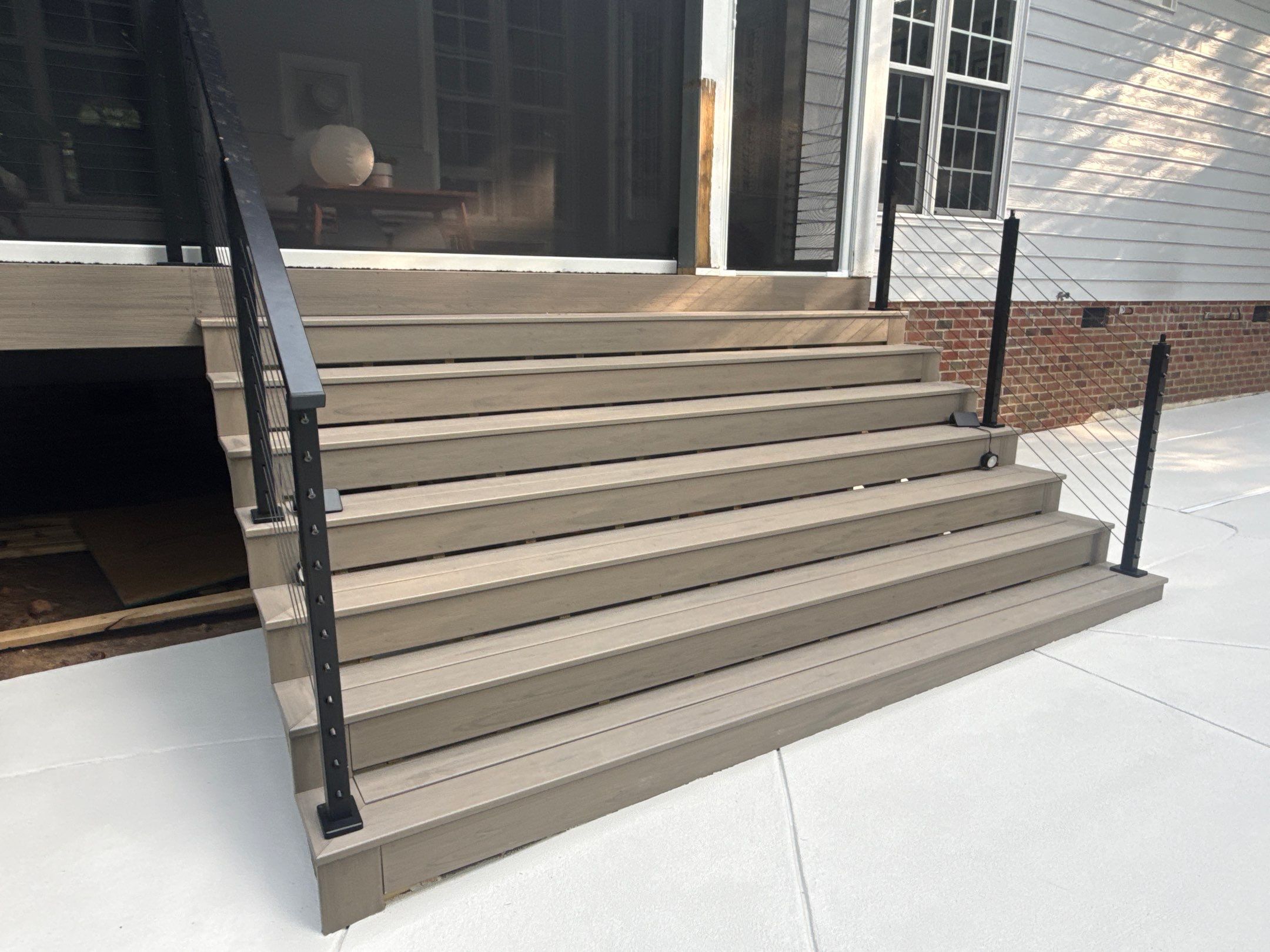 Cool decking pool in Youngsville by Martinez Brother’s Nc Landscaping Inc