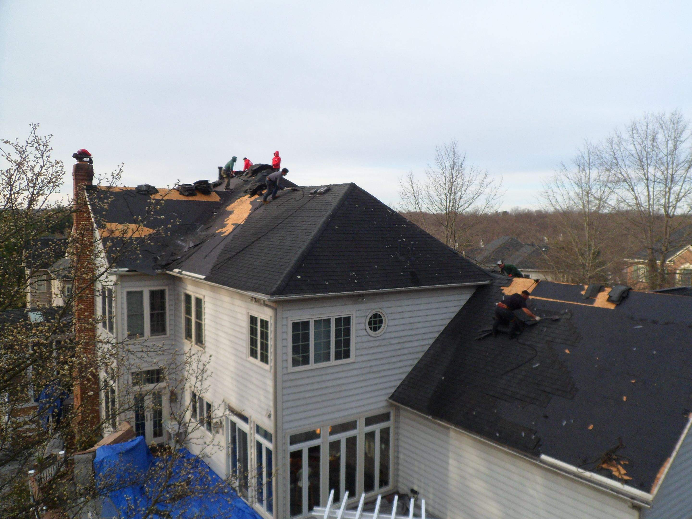 New Roof Installation & New Gutters and downspouts  by Alpha Design Services