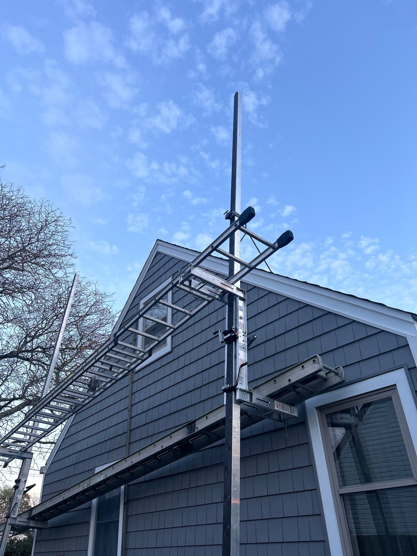 "Levittown Beauty Unveiled: A Siding Transformation Story" by Nisi Home Improvement