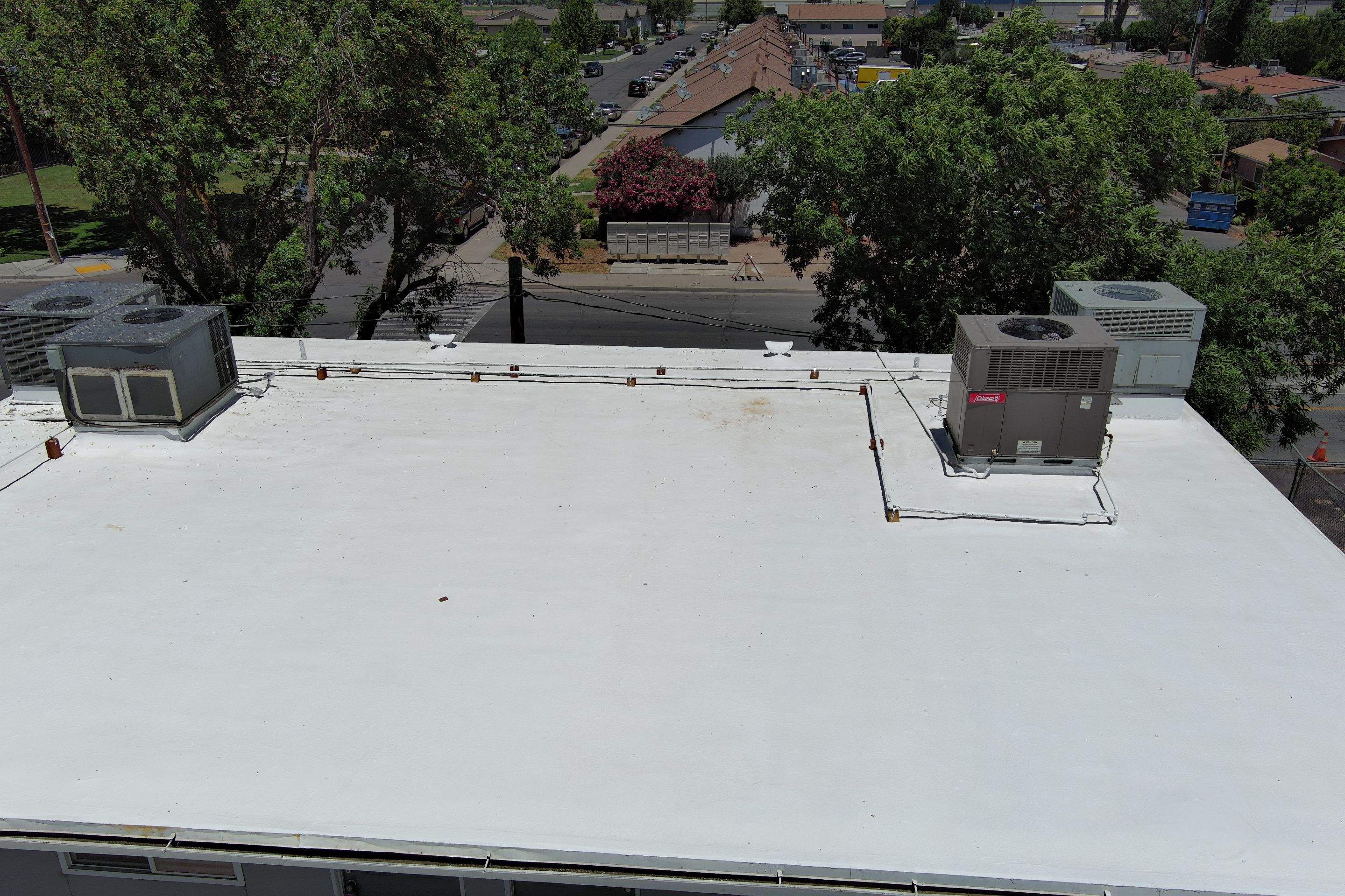Foam Refurbish using General Coatings acrylic coatings and spray foam by Straight Edge Roofing Inc