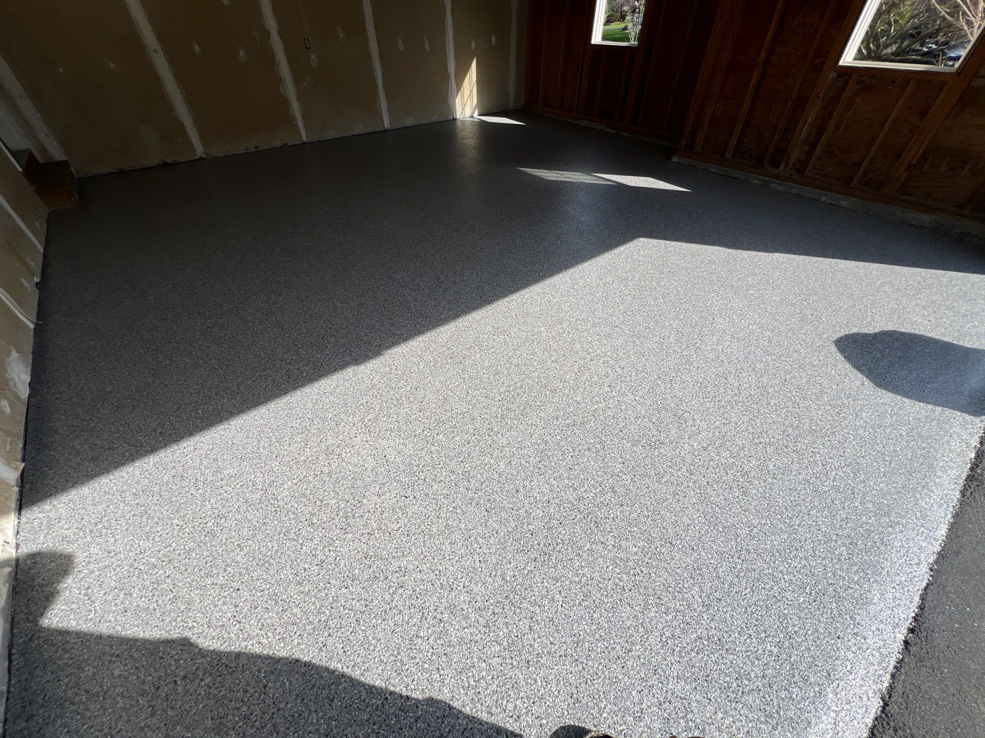 Silverado garage floor coating  by NG Masonry & Construction LLC
