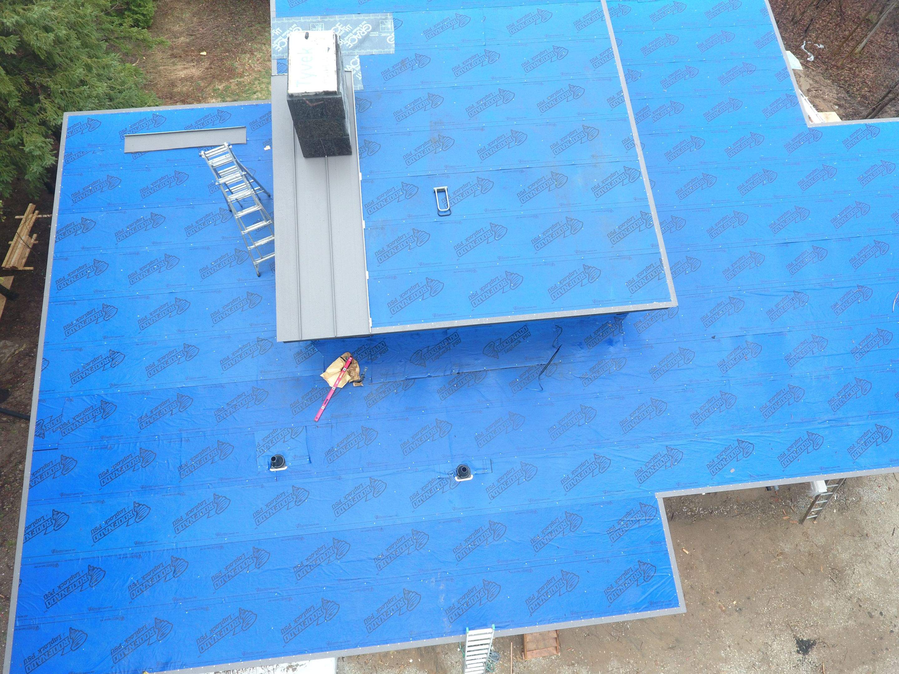 Residential Roofing Installation using 24 Ga Standing Seam Metal by Jay Carter Roofing & Sheet Metal