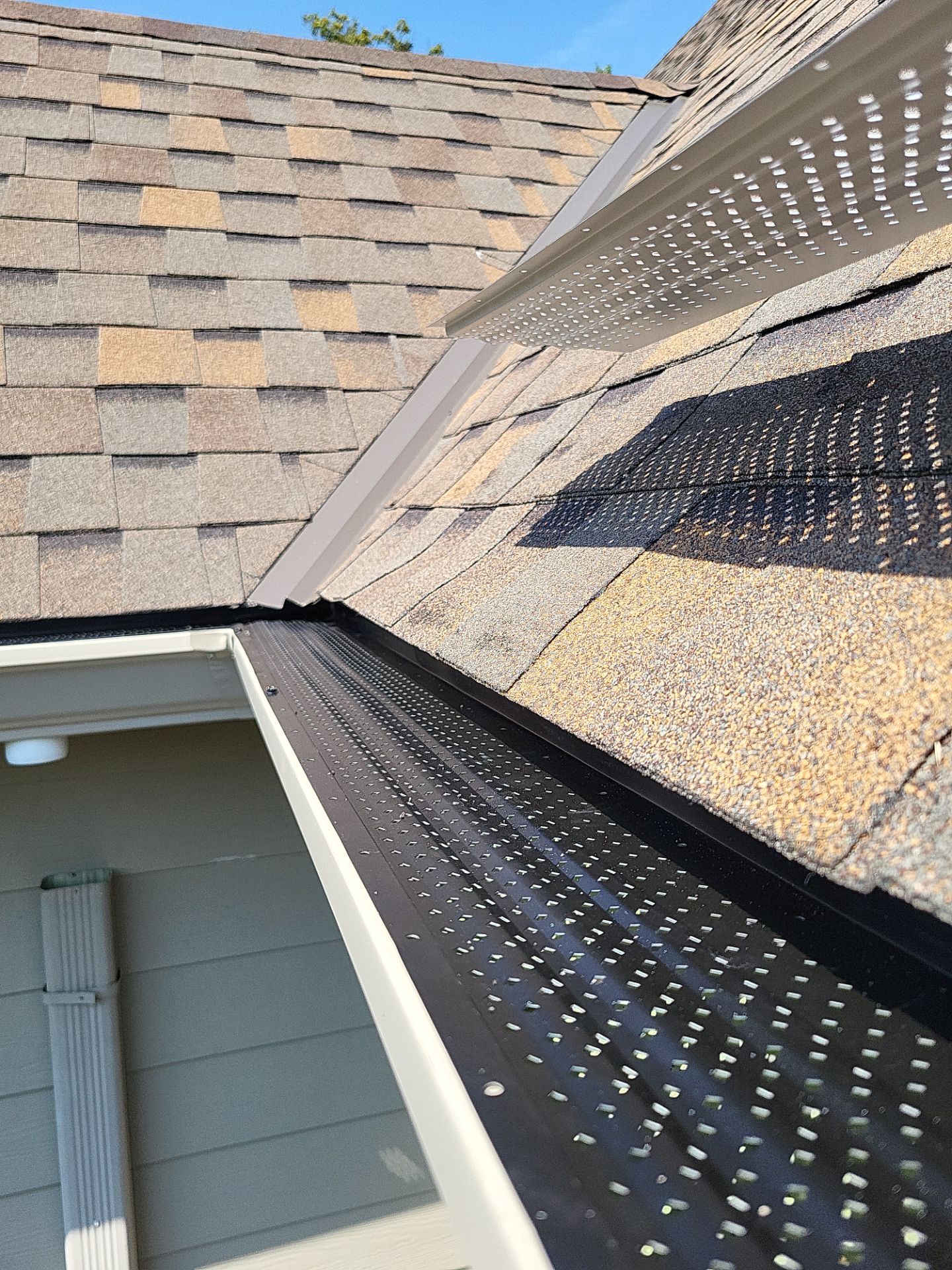 Residential Roofing + Gutters & Downspouts & Gutter Guards Install  by Titan Commercial & Residential Roofing 