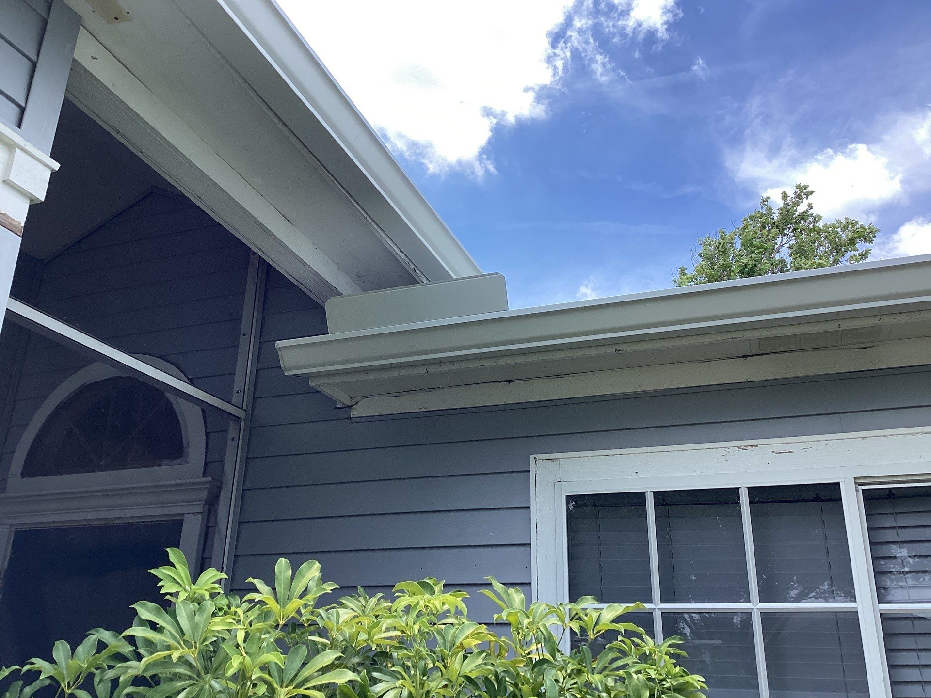 Aluminum Seamless Gutters using Splash Guard in Cape Coral FL by Gutter Professors