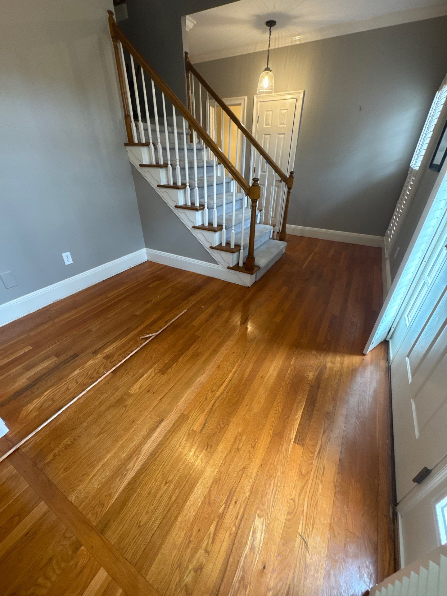 Dark Walnut Hardwood Floor Refinishing and Cabinet Painting in Atlanta by Swift Home Renovations