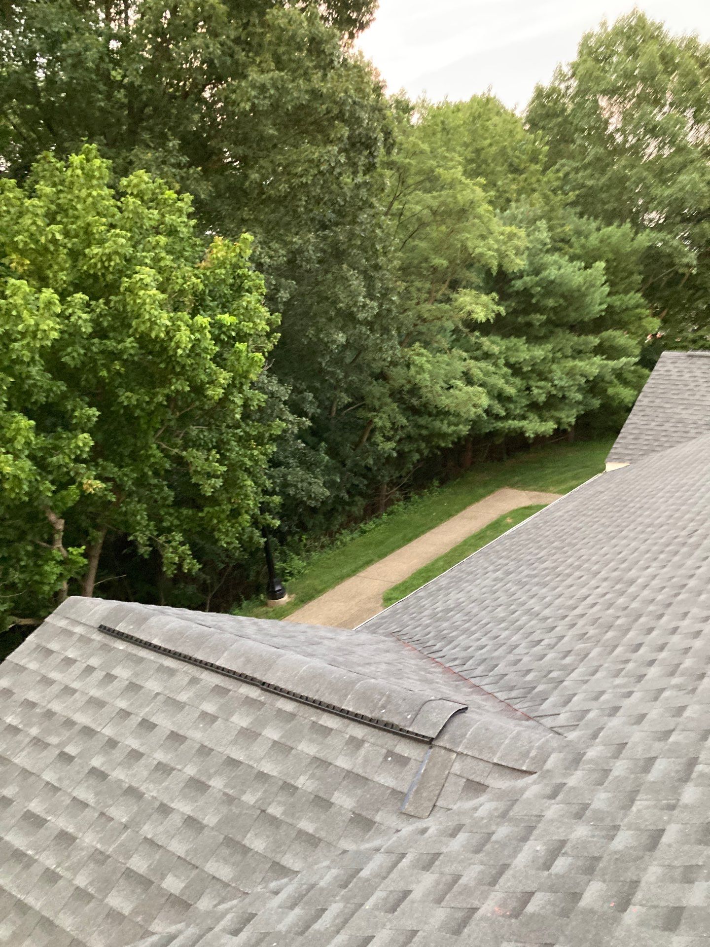 Commercial Roofing Installation using GAF Timberline HDZ Charcoal by Rainstoppers Roofing