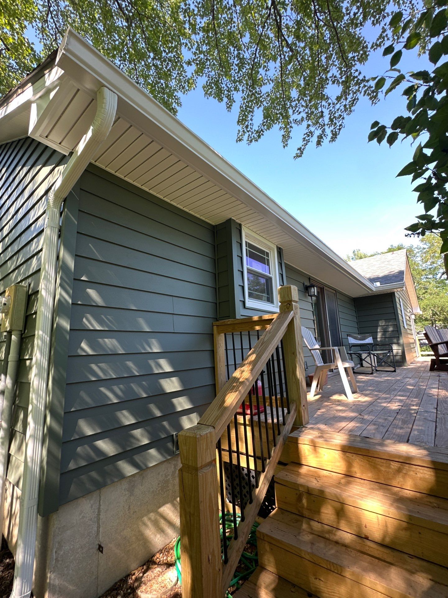 New Craneboard Siding on this Platte City, Mo home  by EEC  Windows, Siding & Roofing 