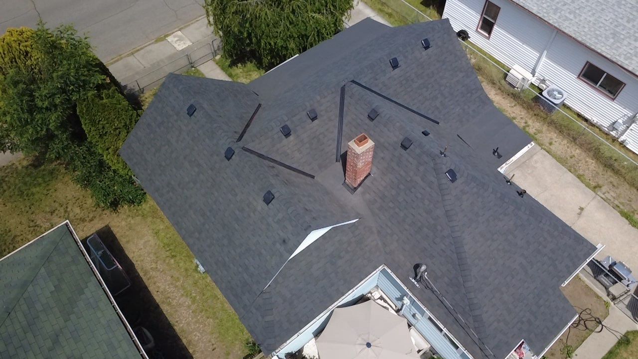 Residential Roof Replacement and Decking Repair in E Courtland Ave Spokane WA 99207 The Cascade System - Certainteed Landmark® Shingle - Moire Black by Alpine Roofing